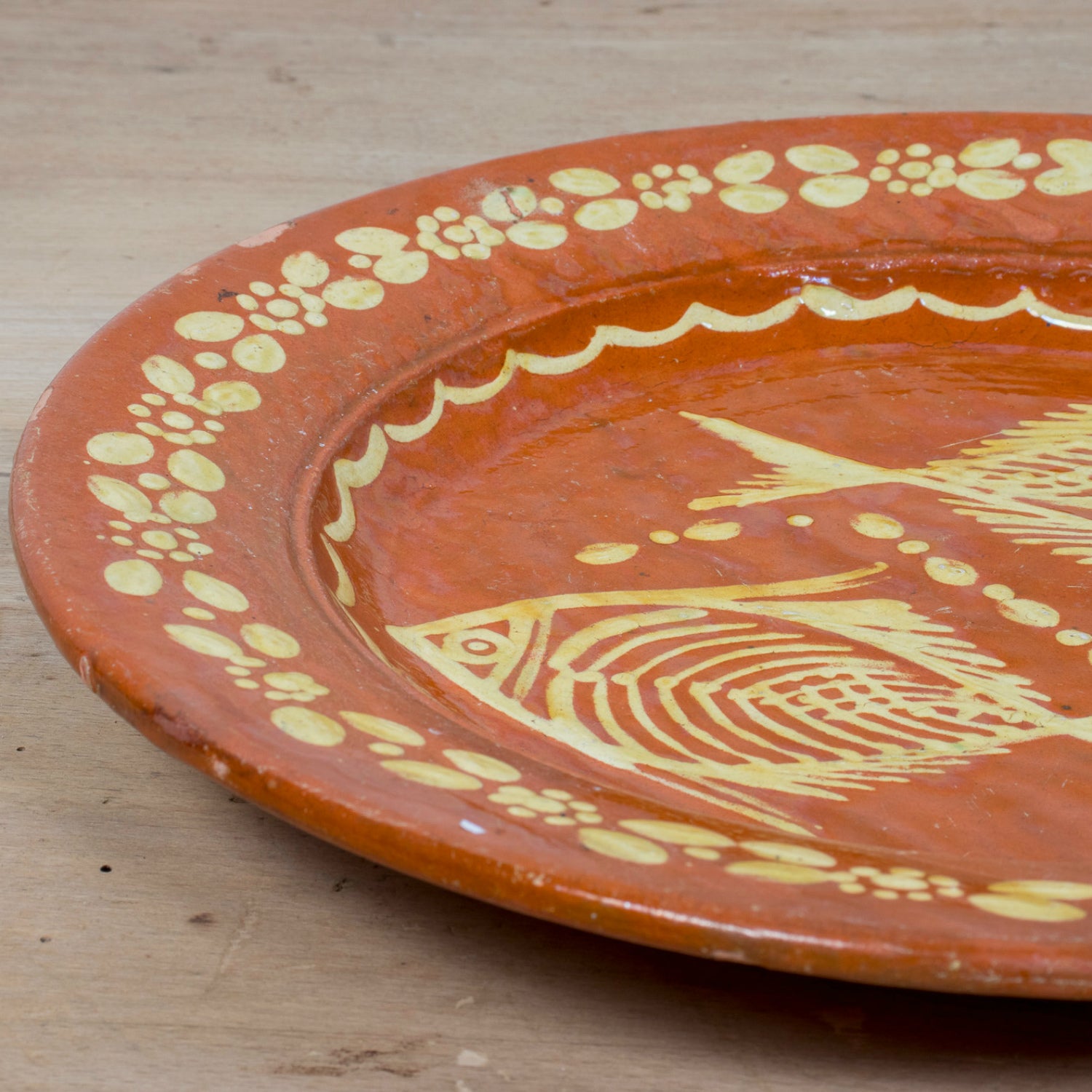 19th Century Round Portuguese Red Slipware Serving Platter with Fish Motif