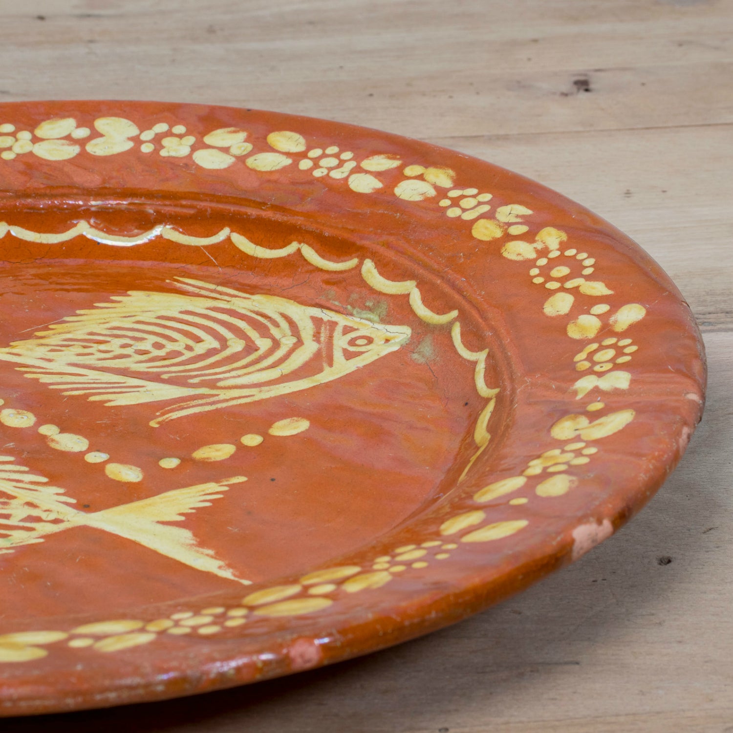 19th Century Round Portuguese Red Slipware Serving Platter with Fish Motif