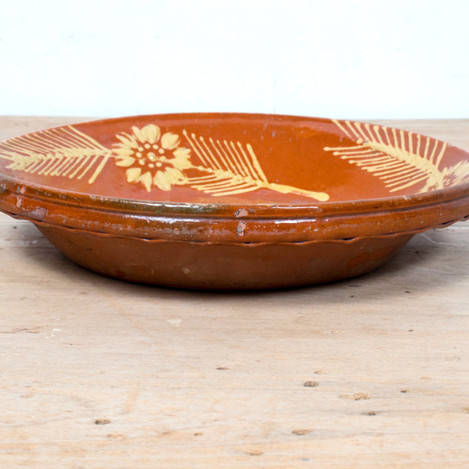 19th Century Portuguese Red Slipware Serving Bowl with Fish and Floral Motifs