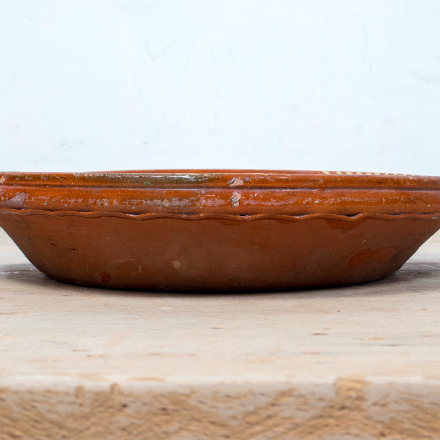 19th Century Portuguese Red Slipware Serving Bowl with Fish and Floral Motifs