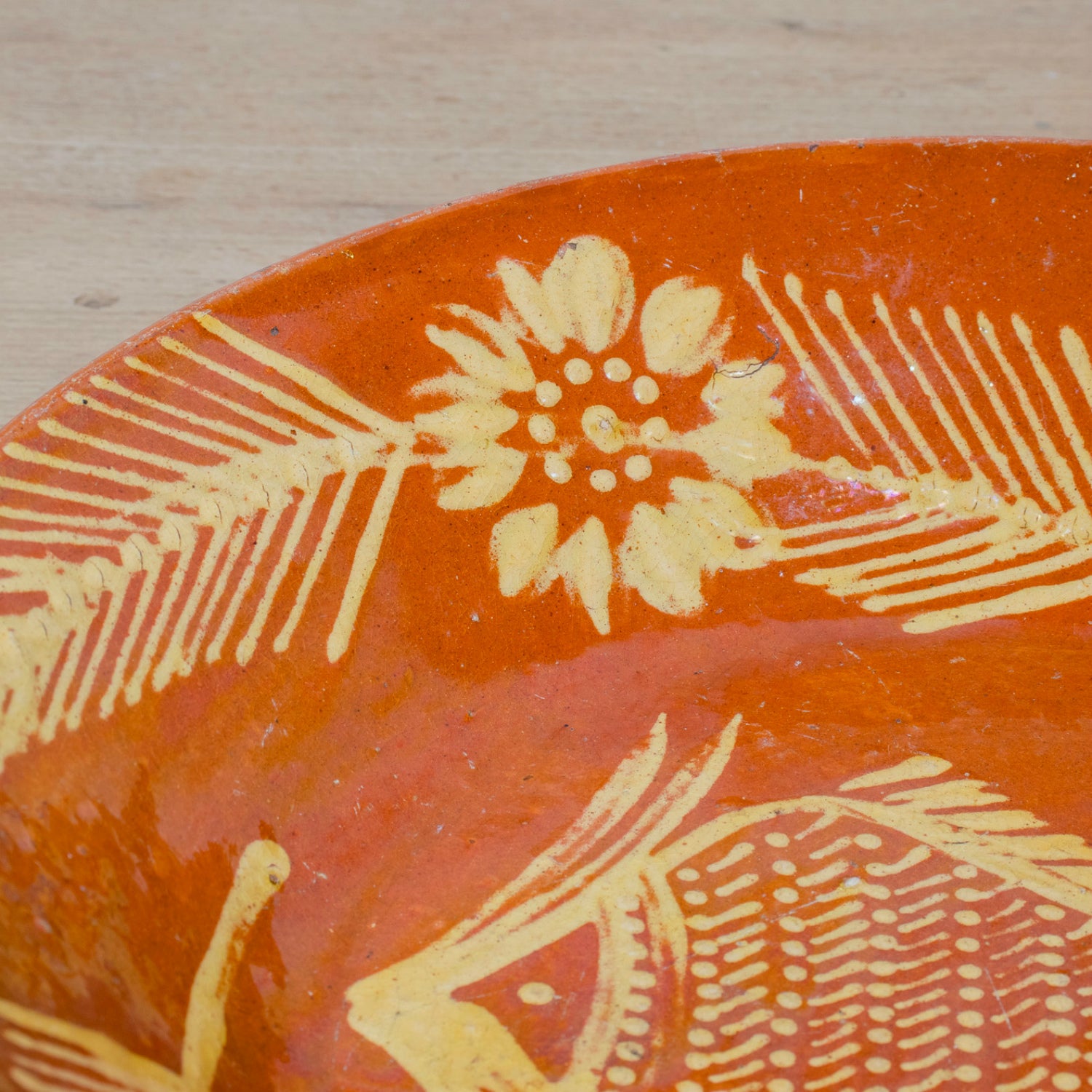 19th Century Portuguese Red Slipware Serving Bowl with Fish and Floral Motifs