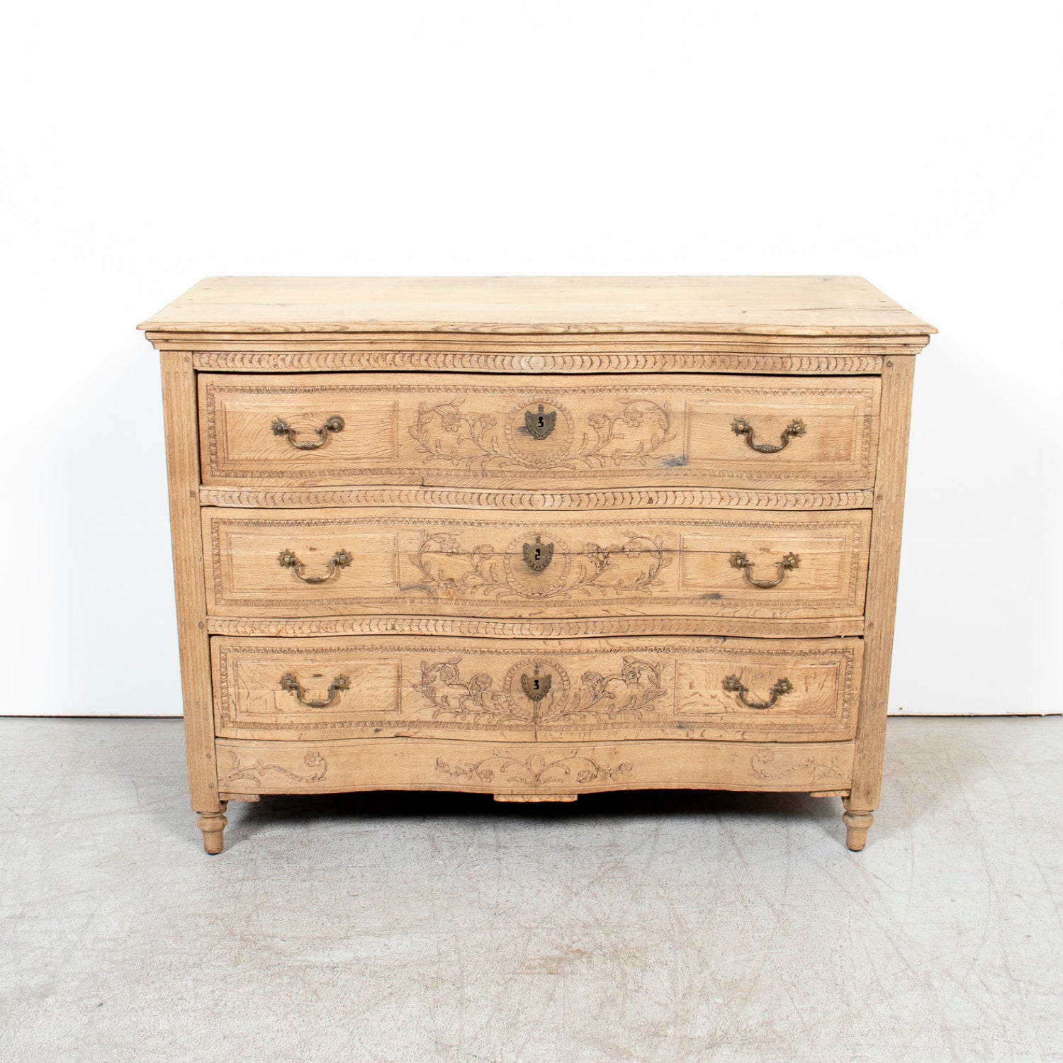 Mid-19th Century French Louis XVI Style Carved Bleached Oak Three-Drawer Serpentine Commode