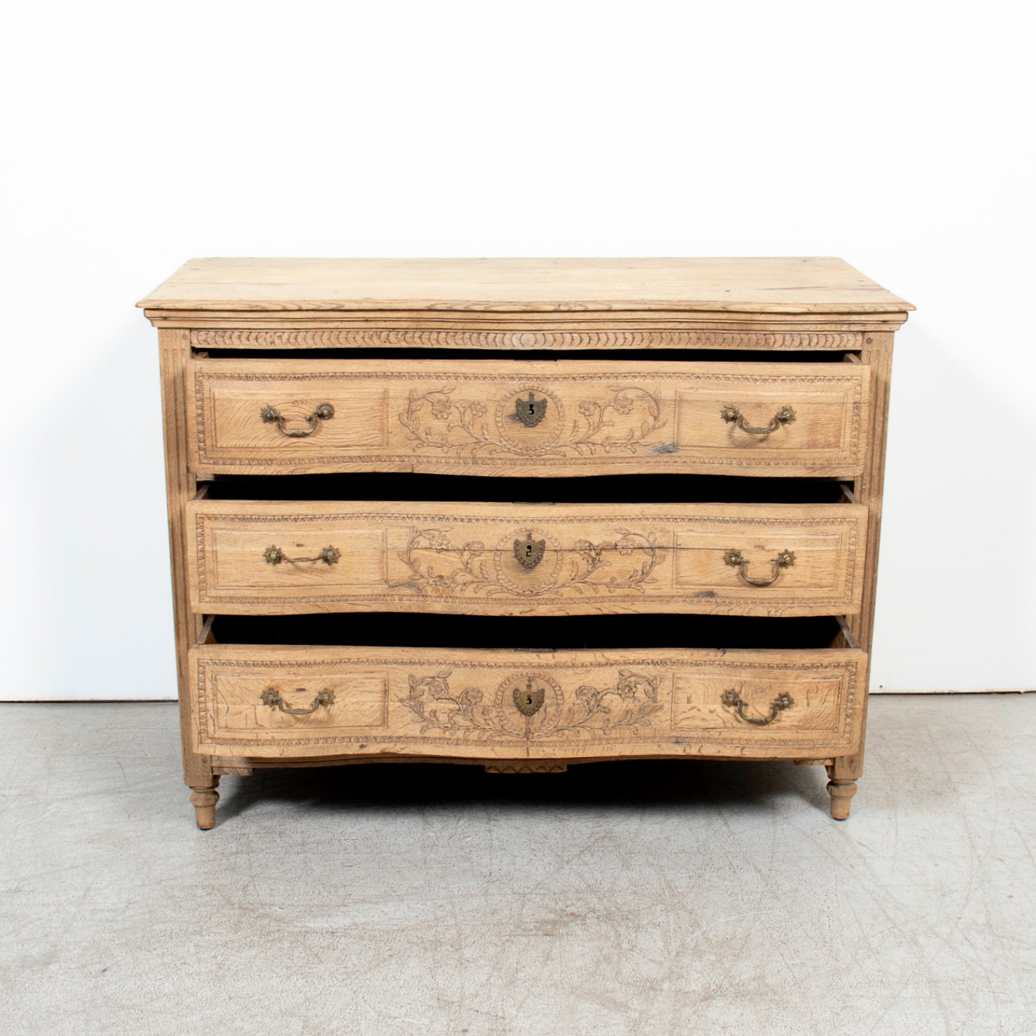 Mid-19th Century French Louis XVI Style Carved Bleached Oak Three-Drawer Serpentine Commode