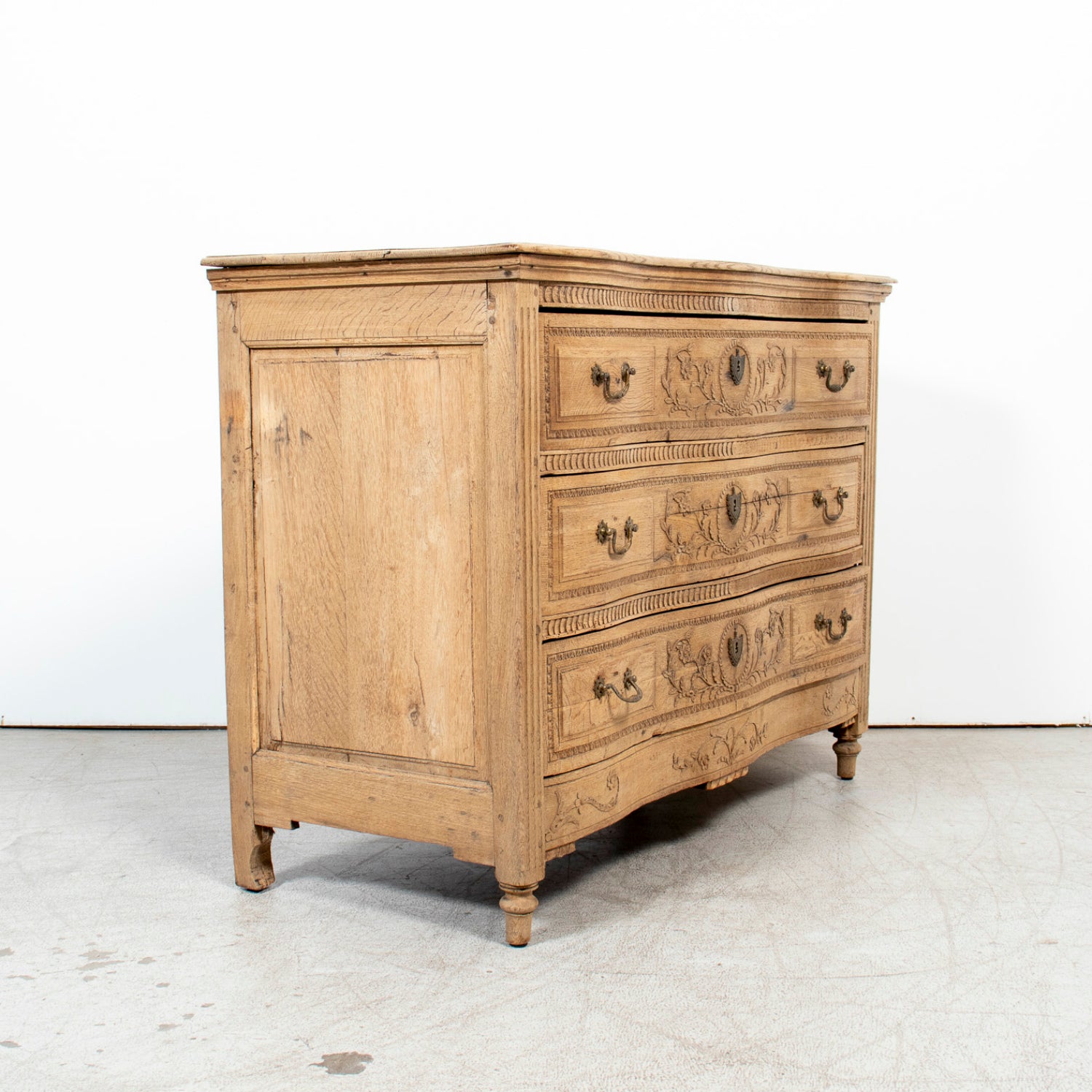 Mid-19th Century French Louis XVI Style Carved Bleached Oak Three-Drawer Serpentine Commode