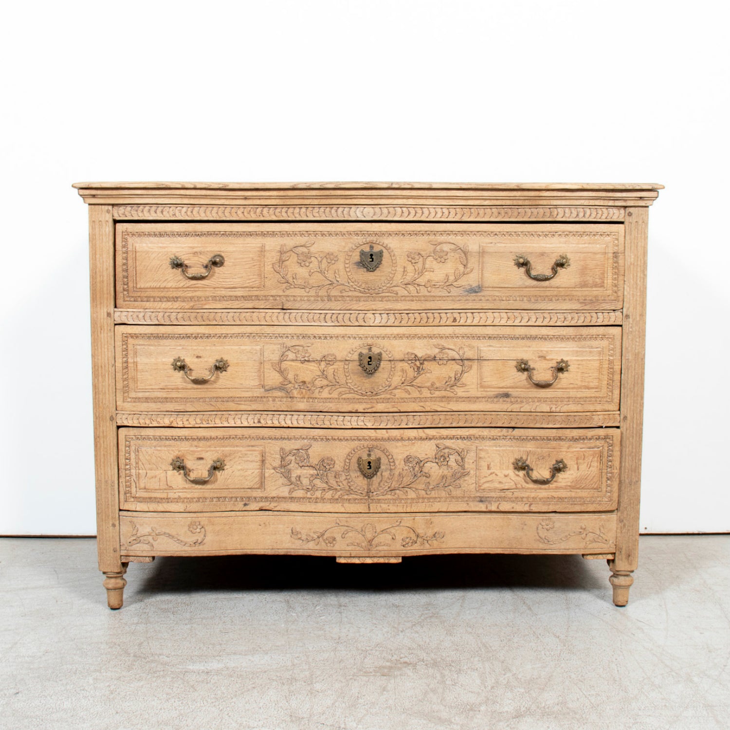Mid-19th Century French Louis XVI Style Carved Bleached Oak Three-Drawer Serpentine Commode