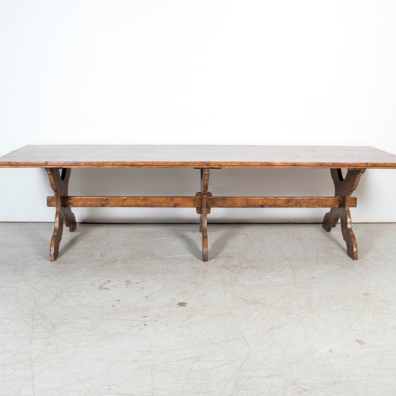 Grand 19th Century Italian Walnut Trestle Table with Scrolled X-Base from Tuscany