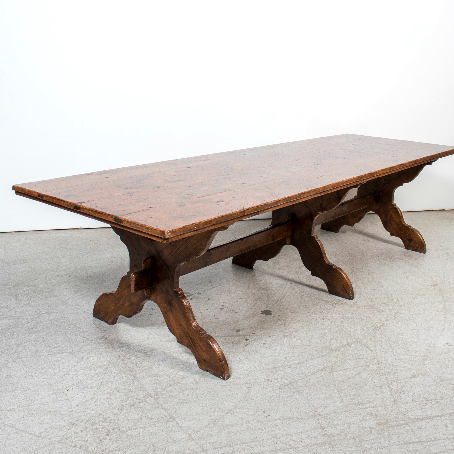 Grand 19th Century Italian Walnut Trestle Table with Scrolled X-Base from Tuscany