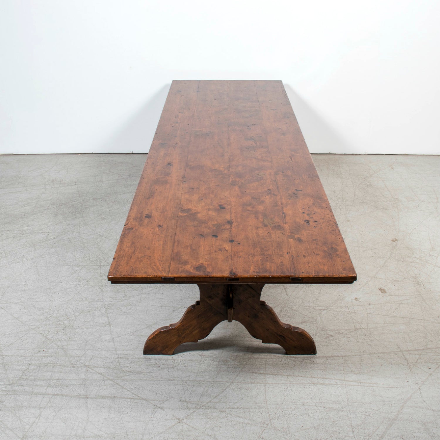 Grand 19th Century Italian Walnut Trestle Table with Scrolled X-Base from Tuscany