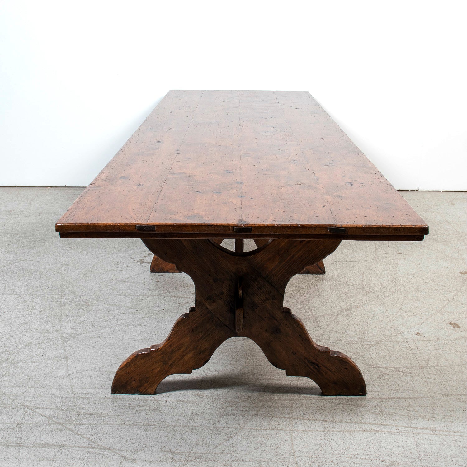 Grand 19th Century Italian Walnut Trestle Table with Scrolled X-Base from Tuscany