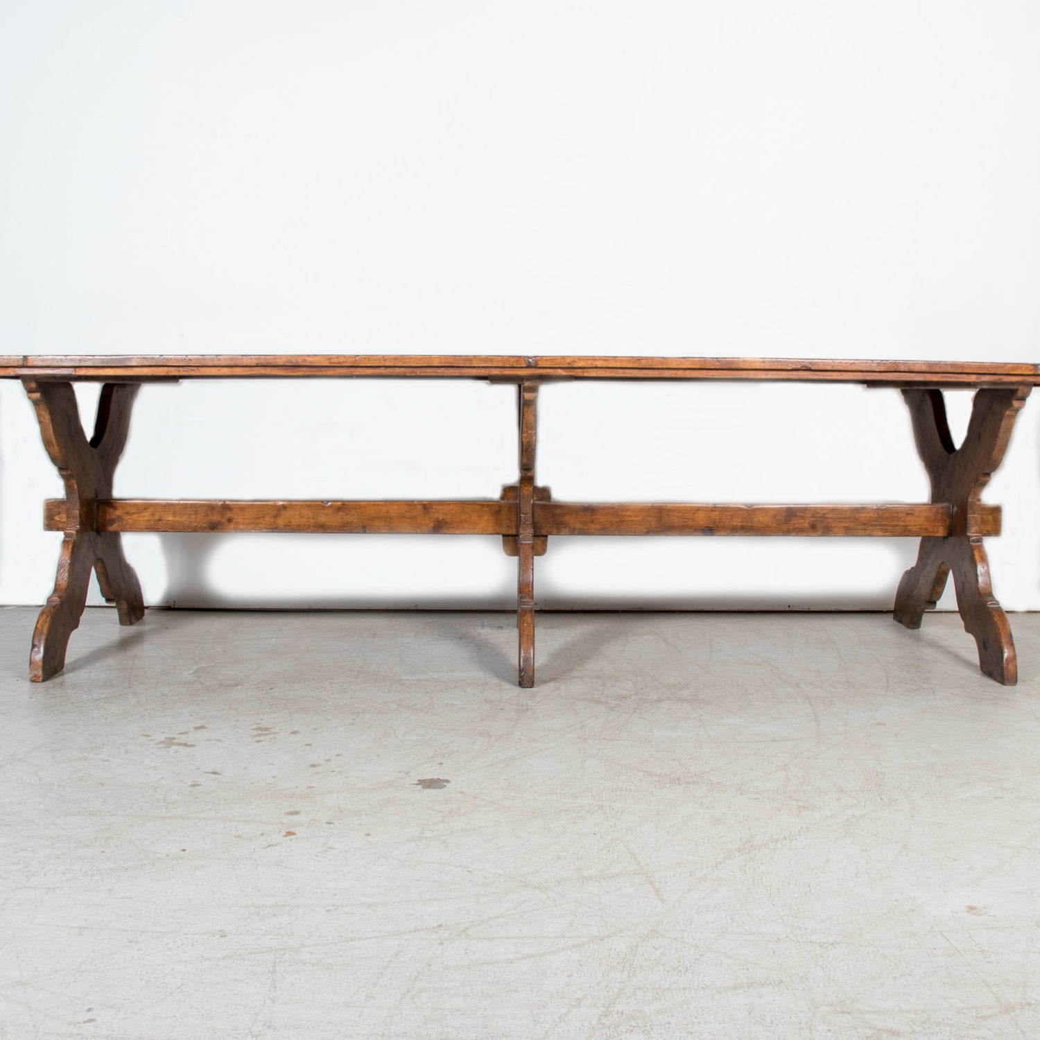 Grand 19th Century Italian Walnut Trestle Table with Scrolled X-Base from Tuscany