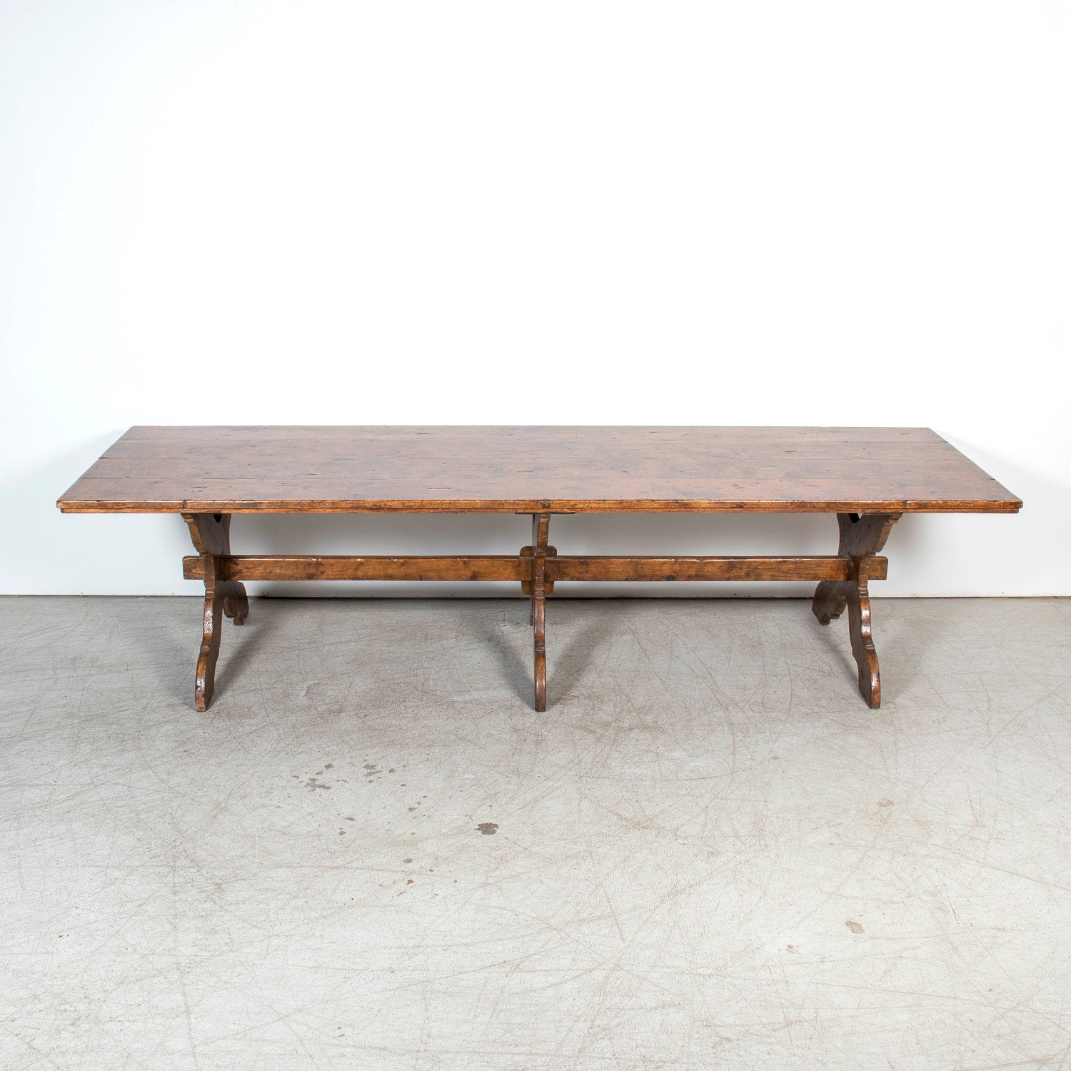 Grand 19th Century Italian Walnut Trestle Table with Scrolled X-Base from Tuscany