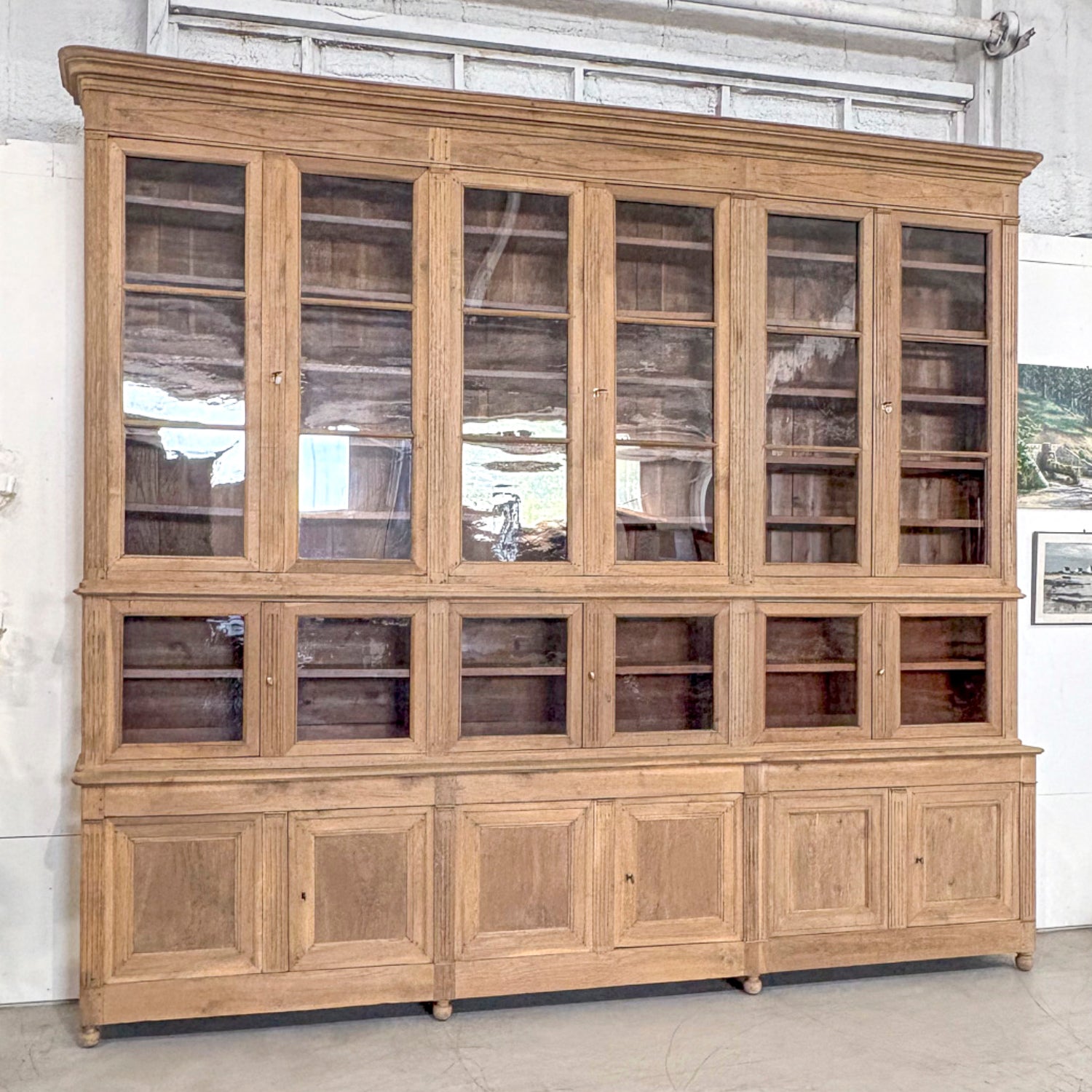 Monumental Early 19th Century French Directoire Period Bleached Oak Bibliothèque à Trois Corps