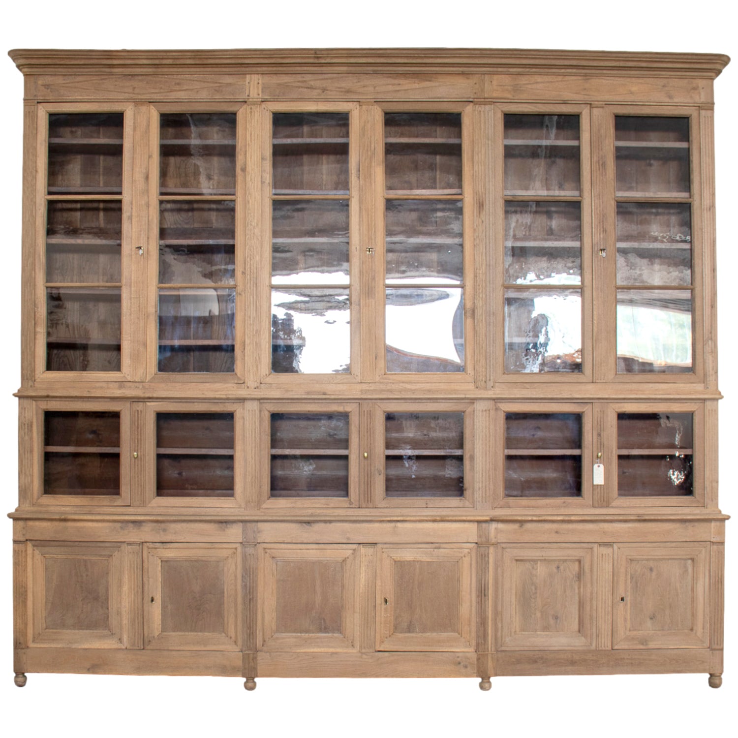 Monumental Early 19th Century French Directoire Period Bleached Oak Bibliothèque à Trois Corps