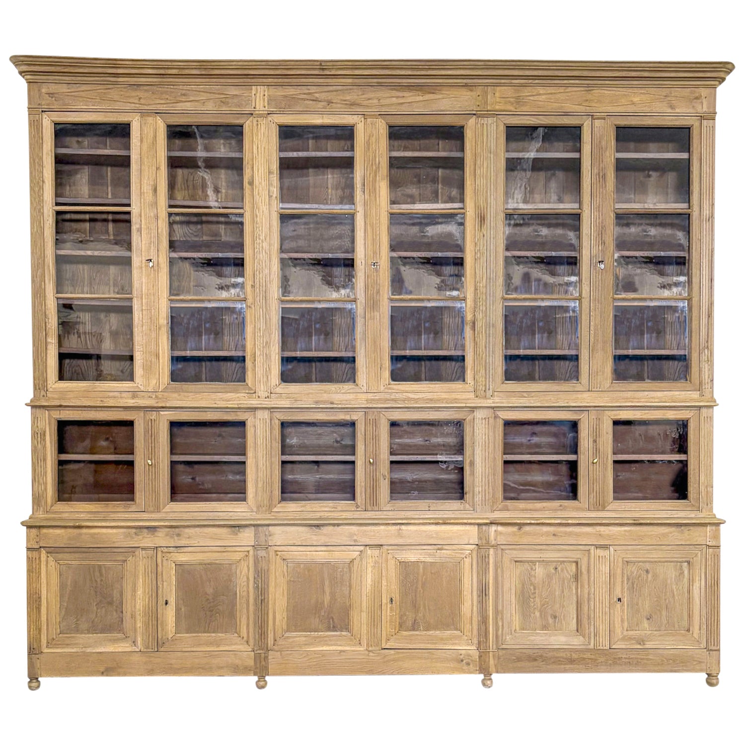 Monumental Early 19th Century French Directoire Period Bleached Oak Bibliothèque à Trois Corps