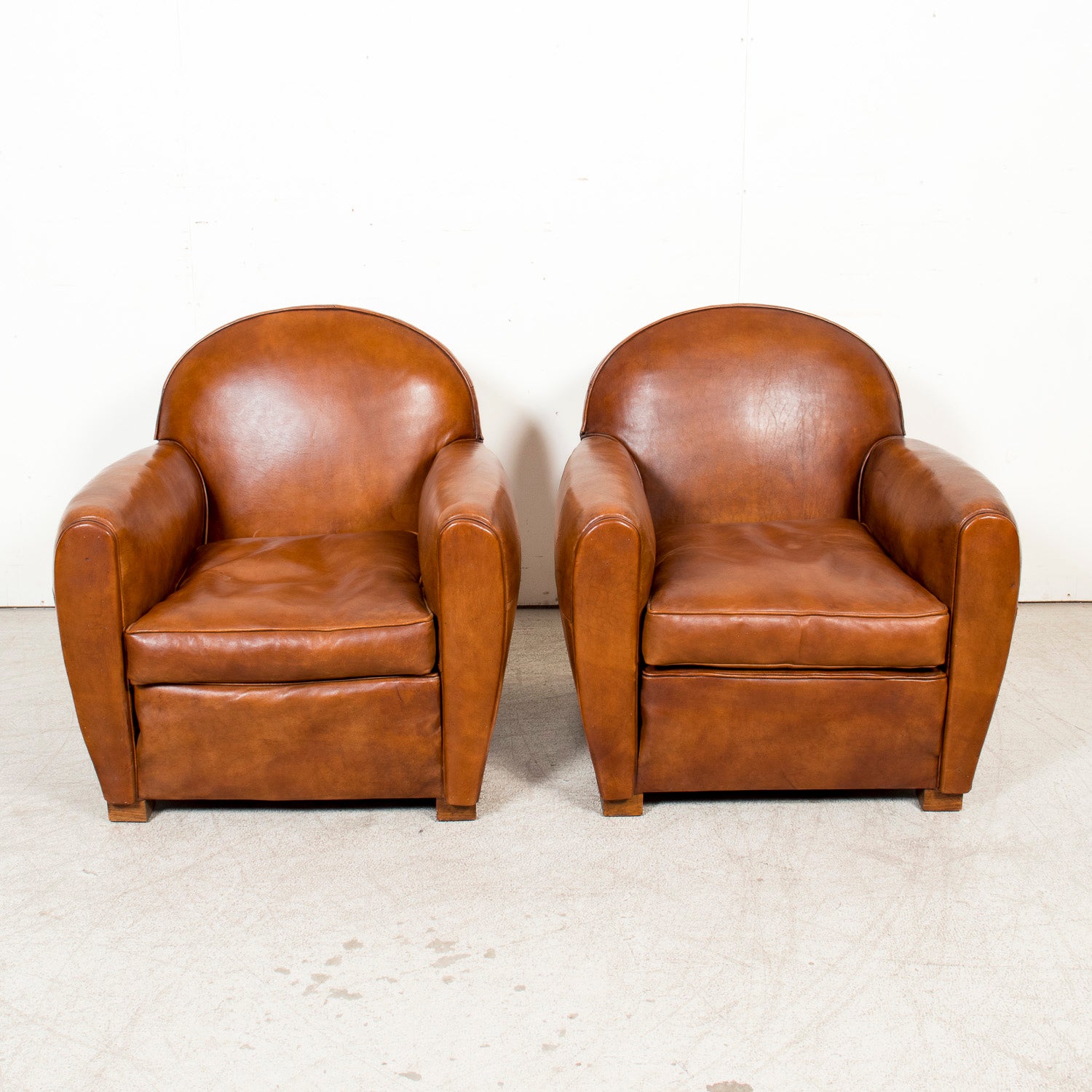 Pair of French Art Deco Period Cognac Leather Club Chairs