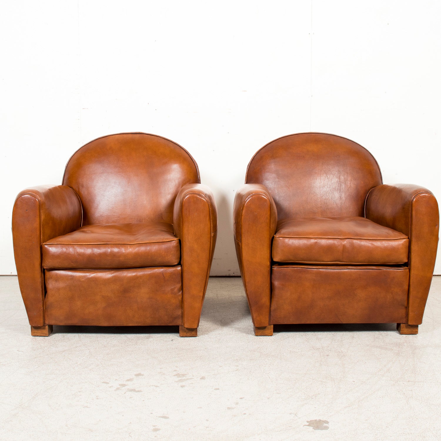 Pair of French Art Deco Period Cognac Leather Club Chairs