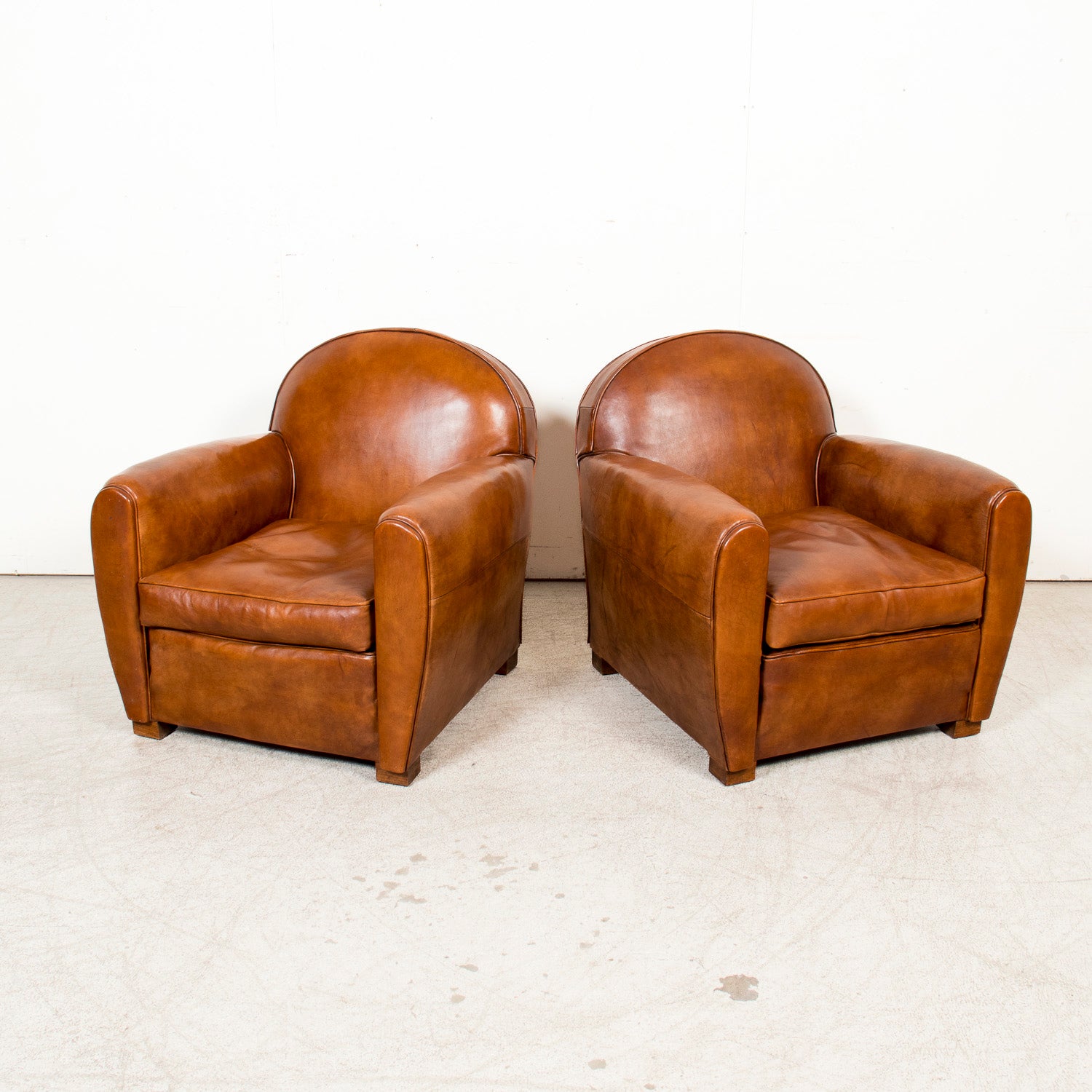 Pair of French Art Deco Period Cognac Leather Club Chairs