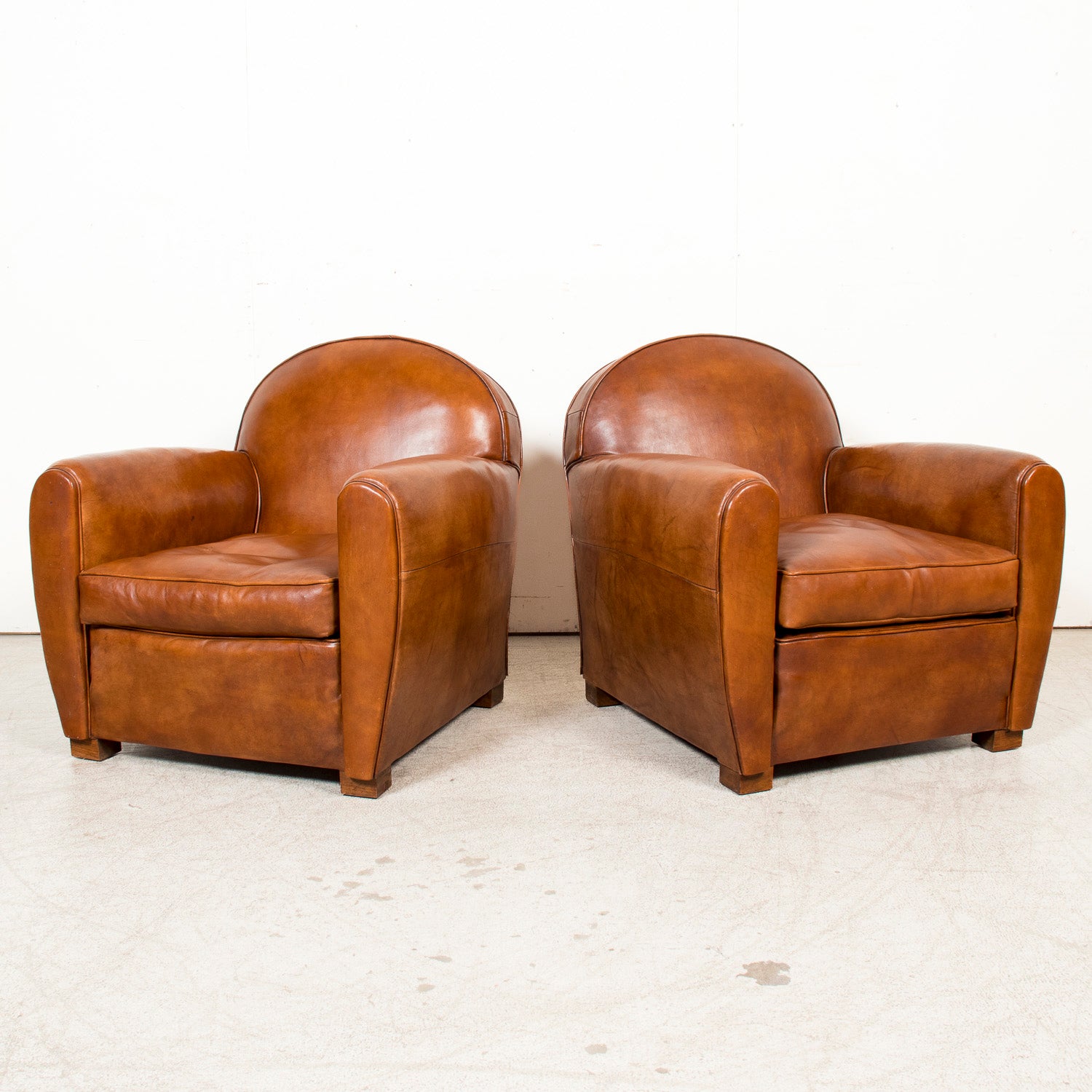 Pair of French Art Deco Period Cognac Leather Club Chairs