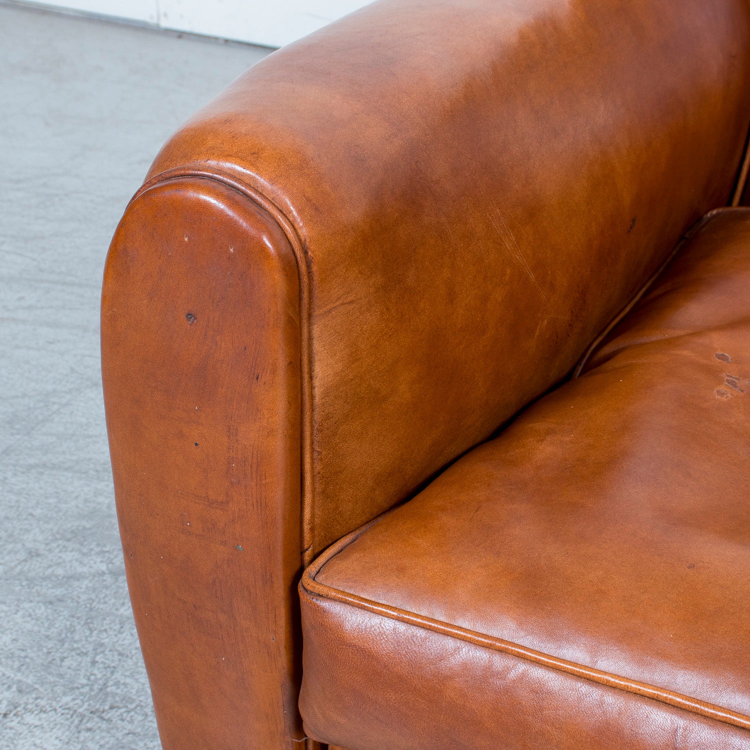 Pair of French Art Deco Period Cognac Leather Club Chairs