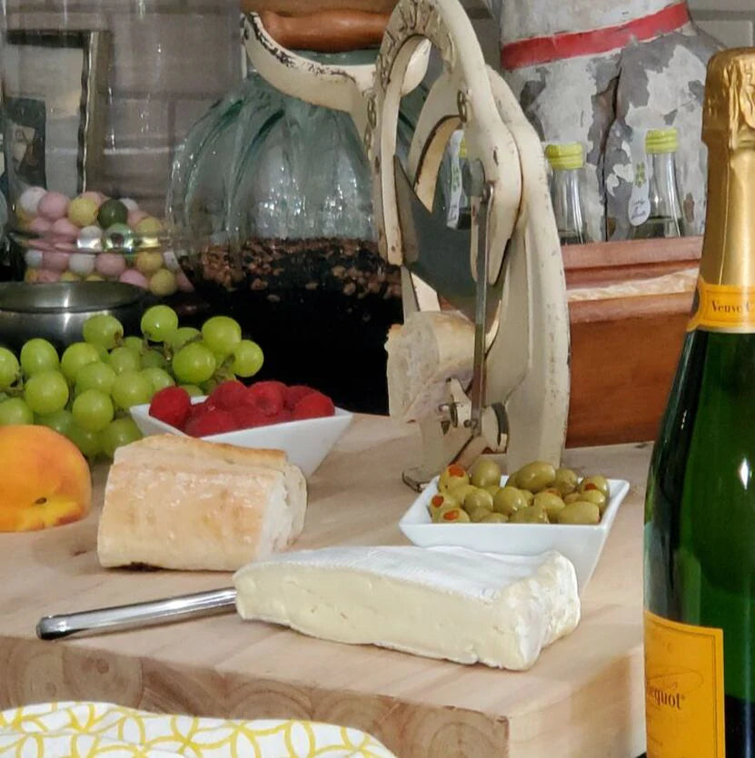 Sun-washed shutters and golden café awnings paint the scene at Place du Forum in Arles — the very square that inspired Van Gogh’s “Café Terrace at Night.
