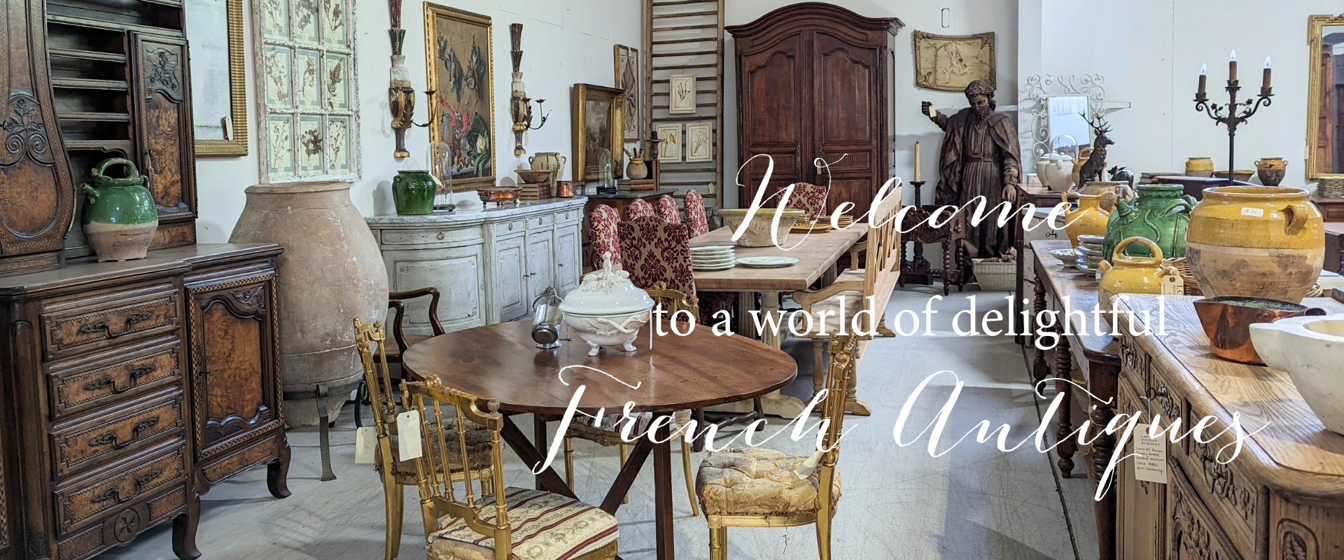 flat lay of antique French oyster plates, asparagus plates, and pottery