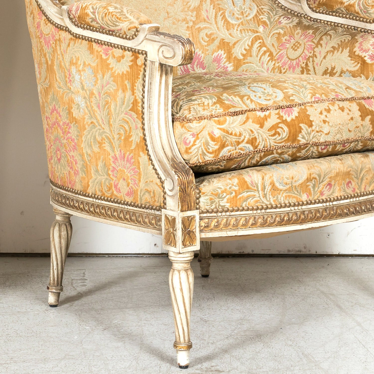 Pair of Early 21st Century French Louis XVI Style Parcel Gilt and Painted Maison Jansen Bergere Armchairs