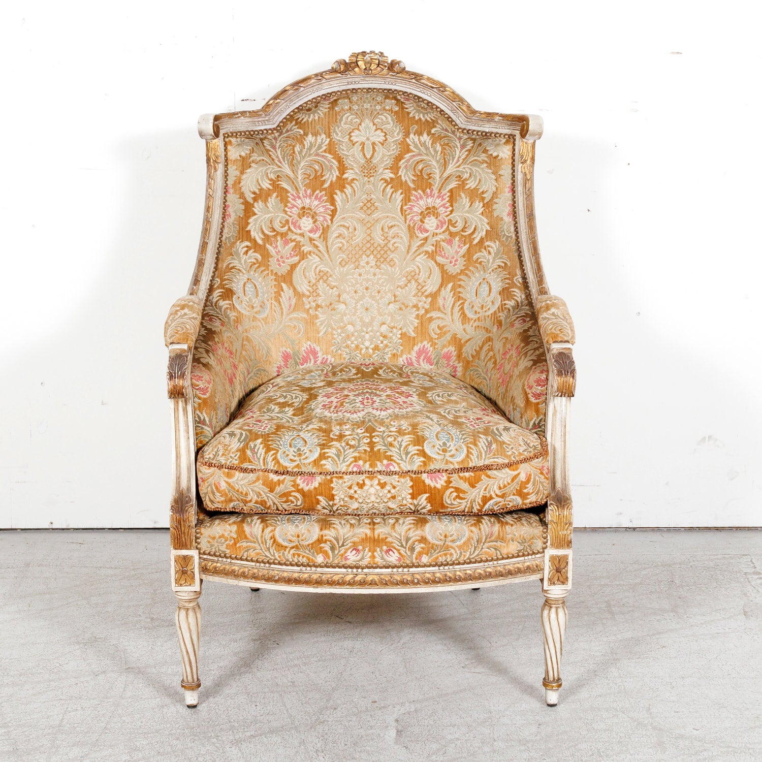 Pair of Early 21st Century French Louis XVI Style Parcel Gilt and Painted Maison Jansen Bergere Armchairs