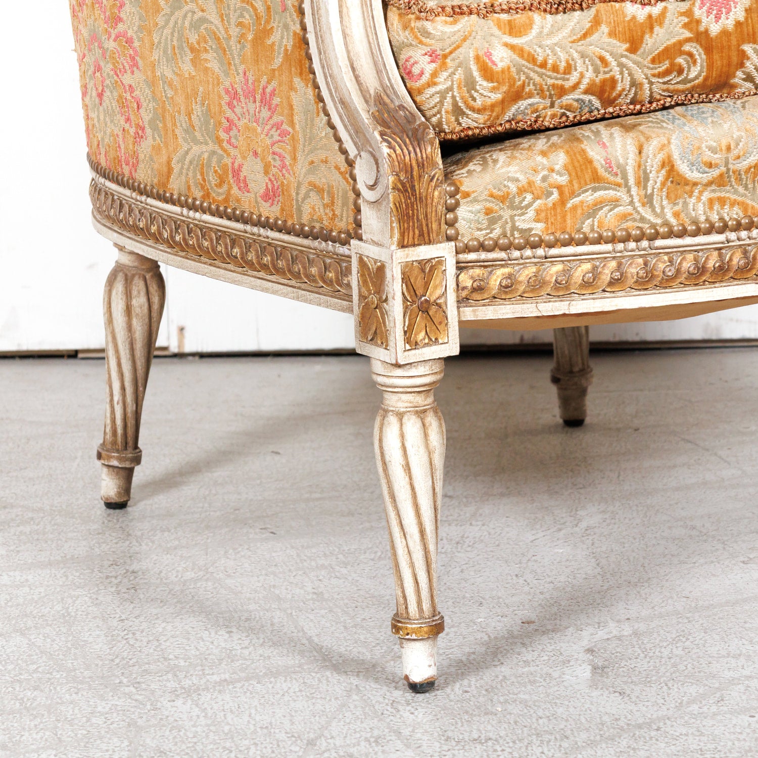 Pair of Early 21st Century French Louis XVI Style Parcel Gilt and Painted Maison Jansen Bergere Armchairs