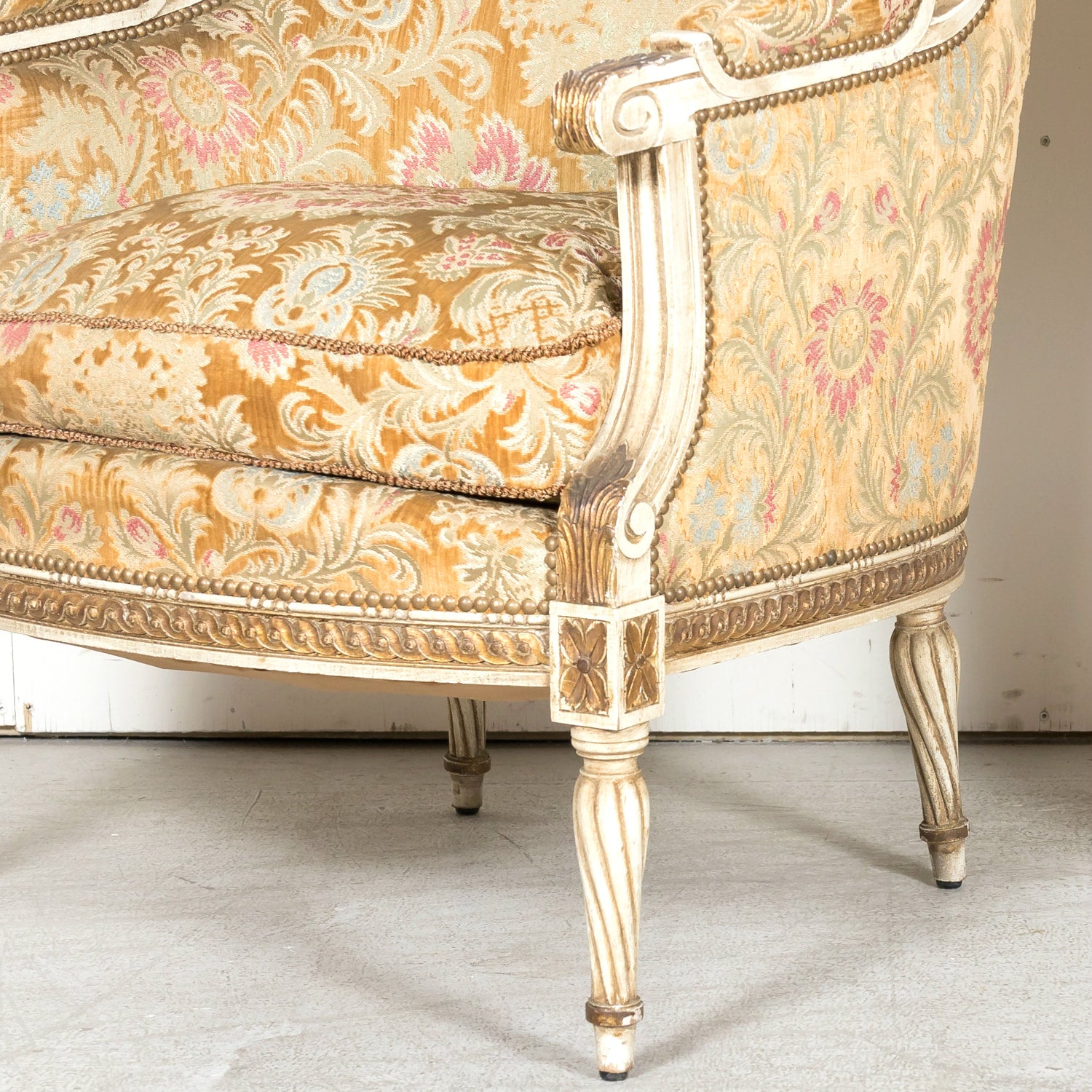Pair of Early 21st Century French Louis XVI Style Parcel Gilt and Painted Maison Jansen Bergere Armchairs