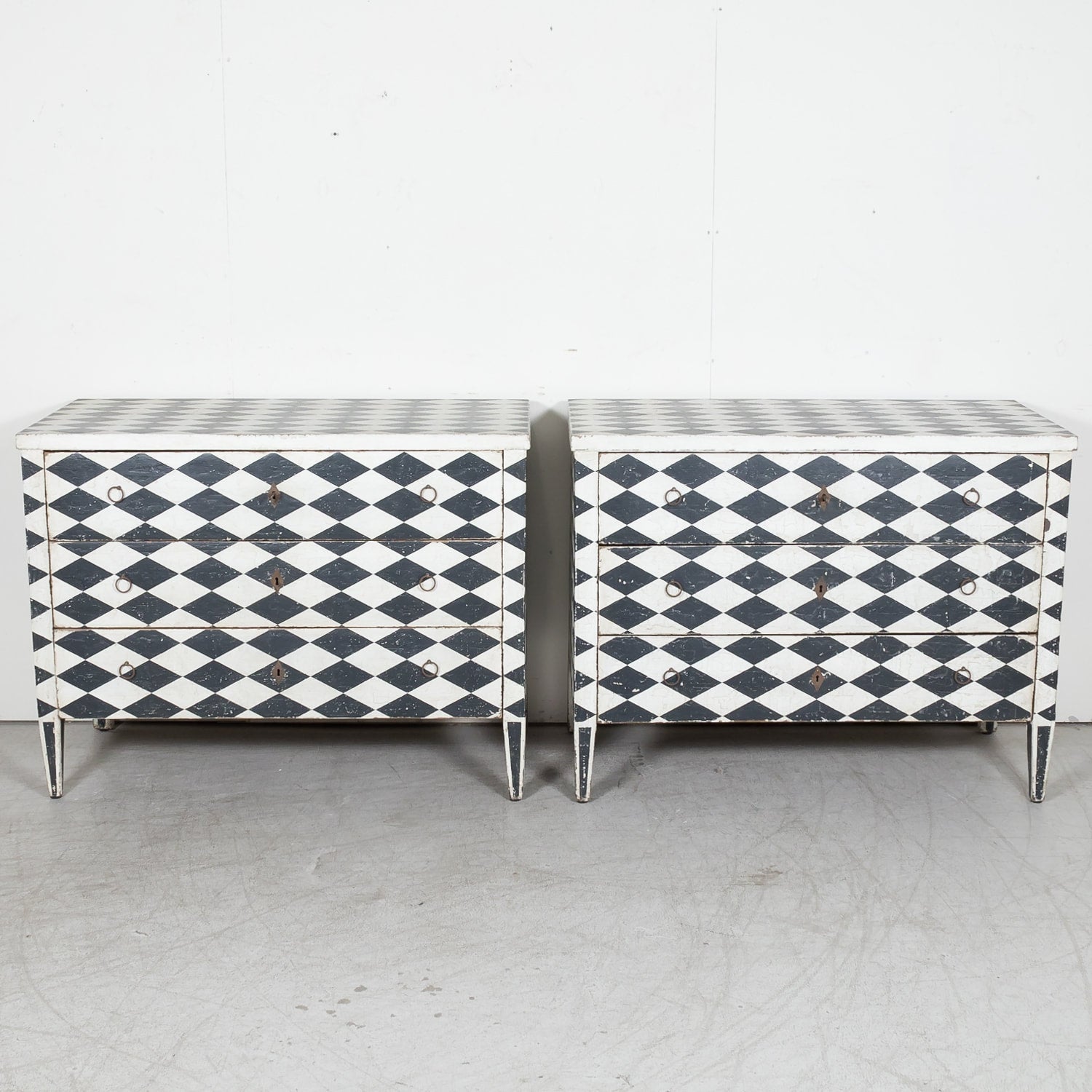 Pair of 19th Century French Louis XVI Style Black and White Harlequin Pattern Painted Commodes 