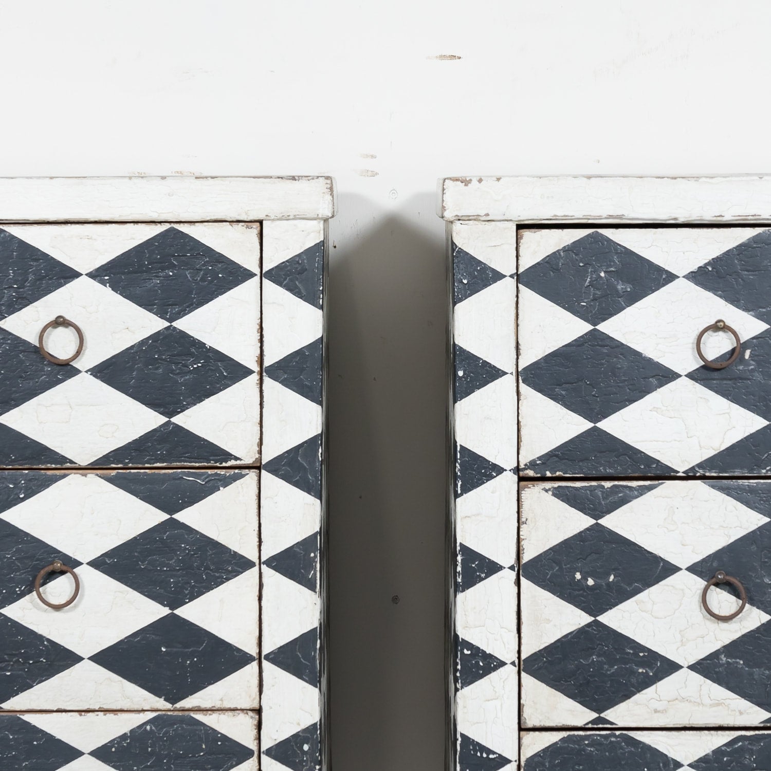 Pair of 19th Century French Louis XVI Style Black and White Harlequin Pattern Painted Commodes 