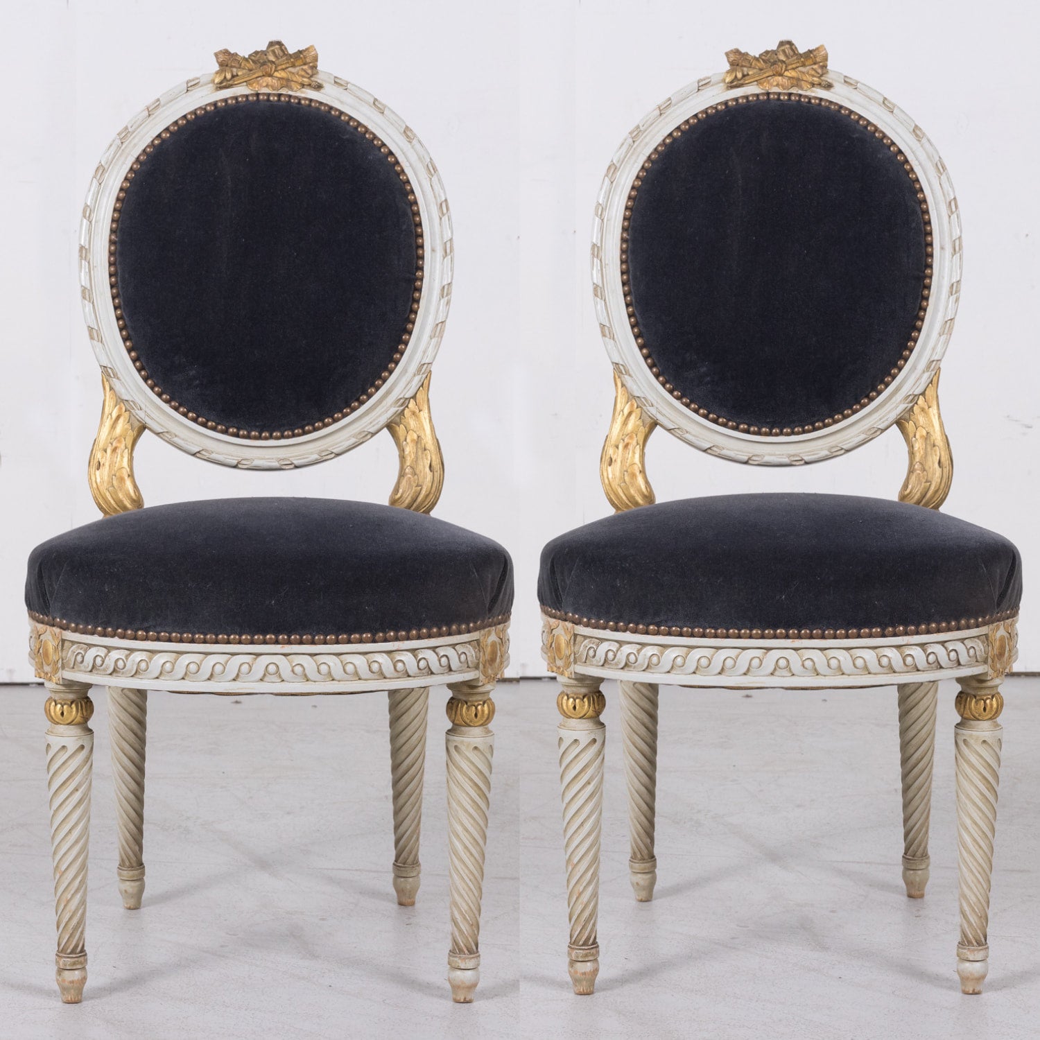 Fine Pair of Antique French Louis XVI Style Parcel Gilt and White Painted Side Chairs