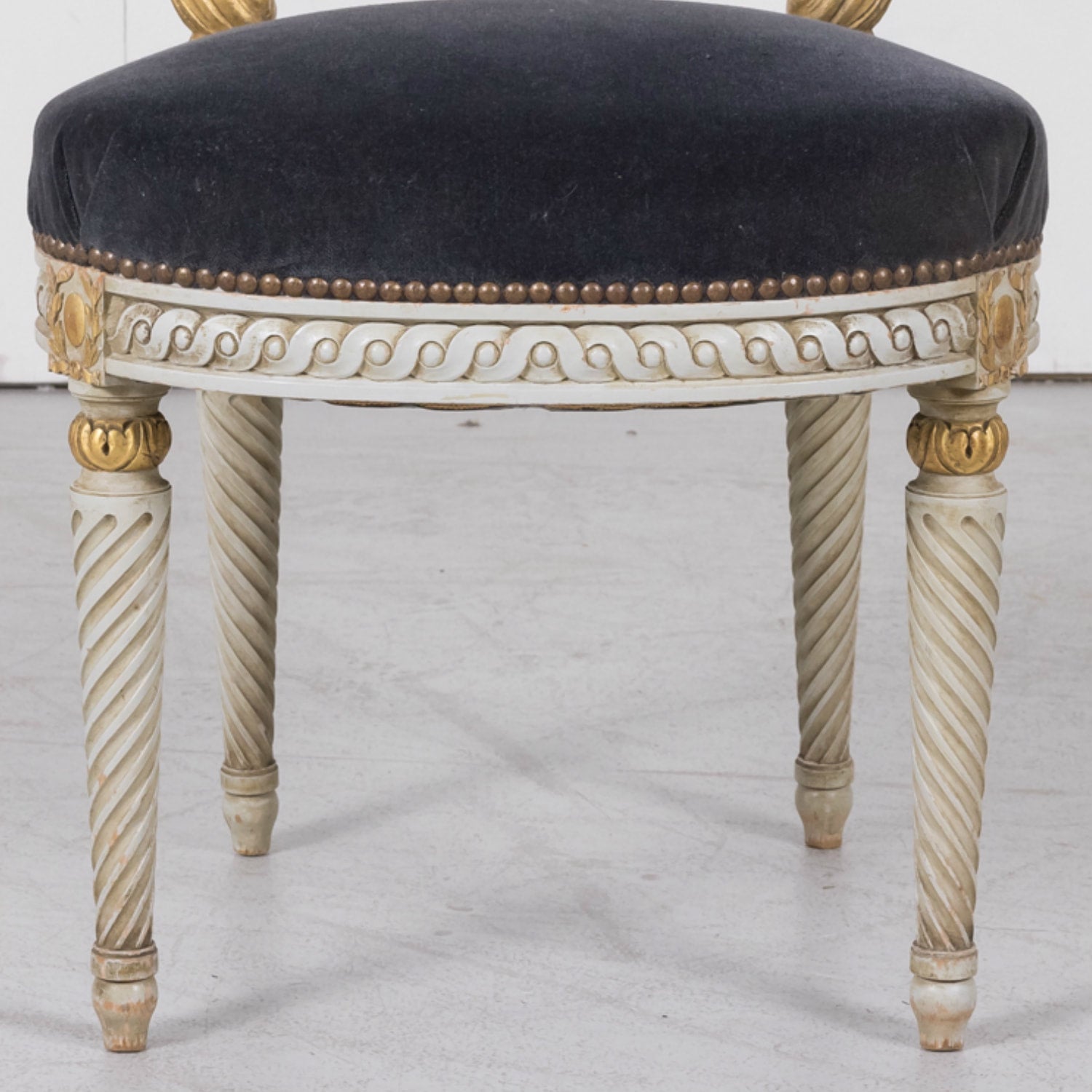 Fine Pair of Antique French Louis XVI Style Parcel Gilt and White Painted Side Chairs