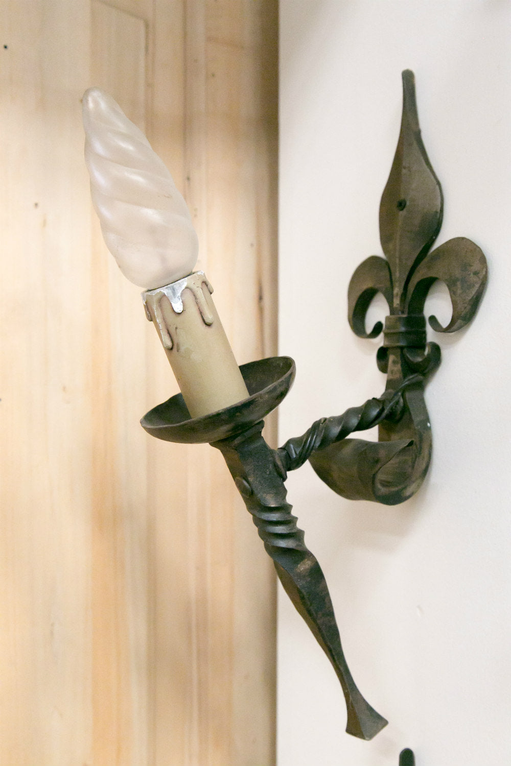 Pair of Country French Hand Forged Iron Fleur de Lis Sconces