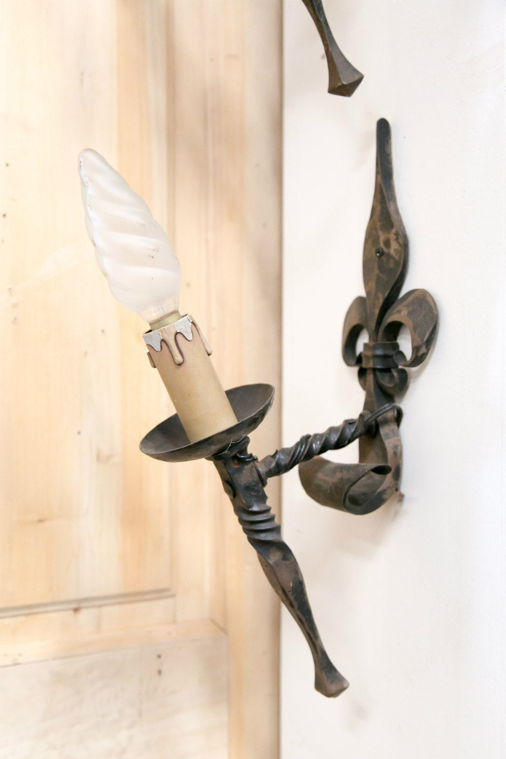 Pair of Country French Hand Forged Iron Fleur de Lis Sconces