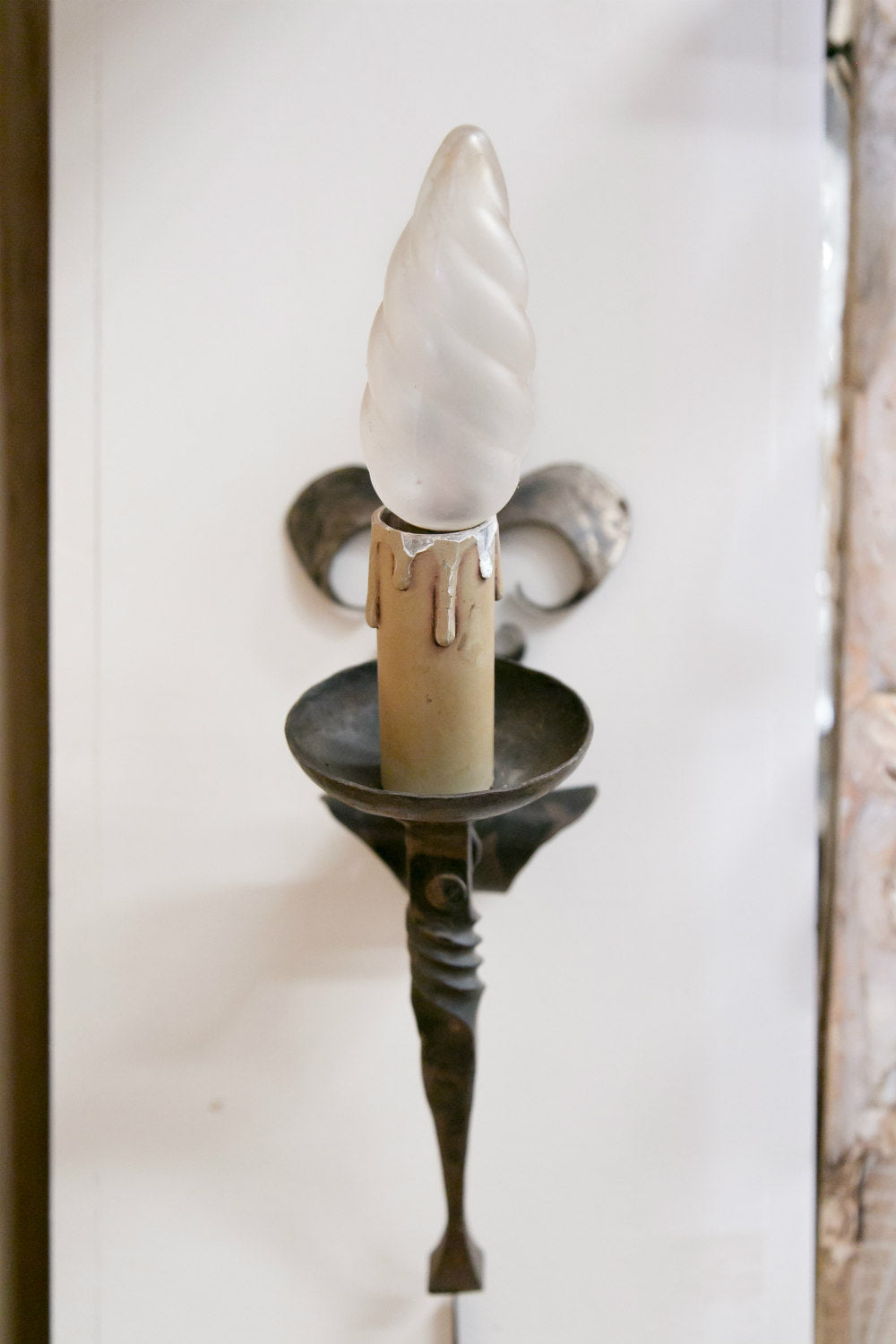 Pair of Country French Hand Forged Iron Fleur de Lis Sconces