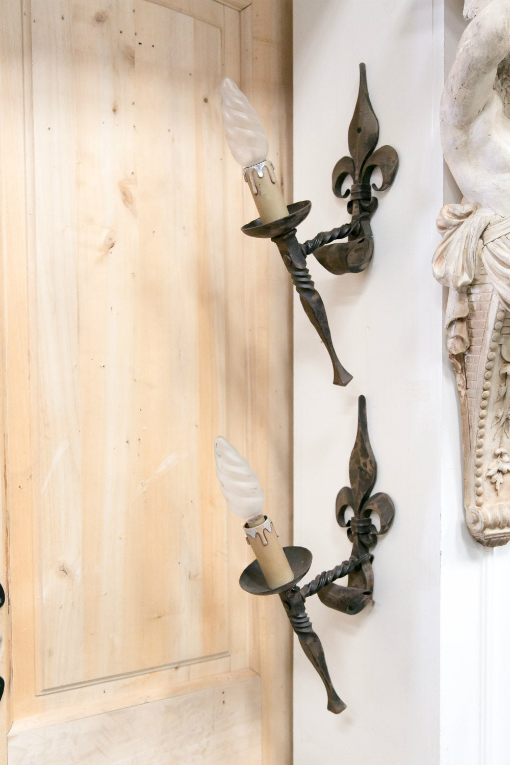 Pair of Country French Hand Forged Iron Fleur de Lis Sconces