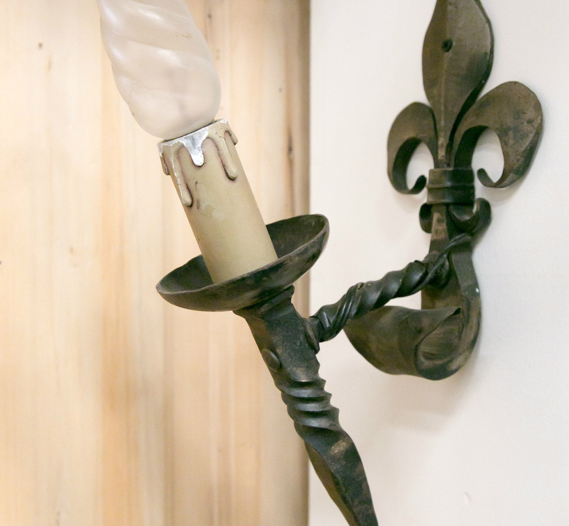 Pair of Country French Hand Forged Iron Fleur de Lis Sconces