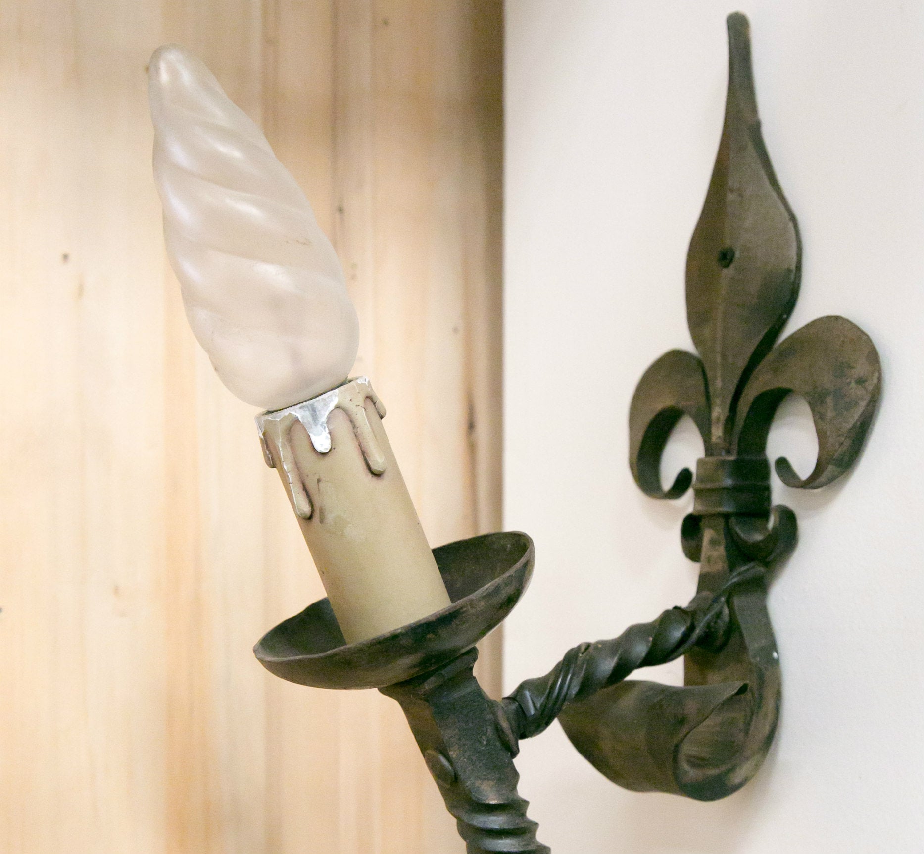 Pair of Country French Hand Forged Iron Fleur de Lis Sconces