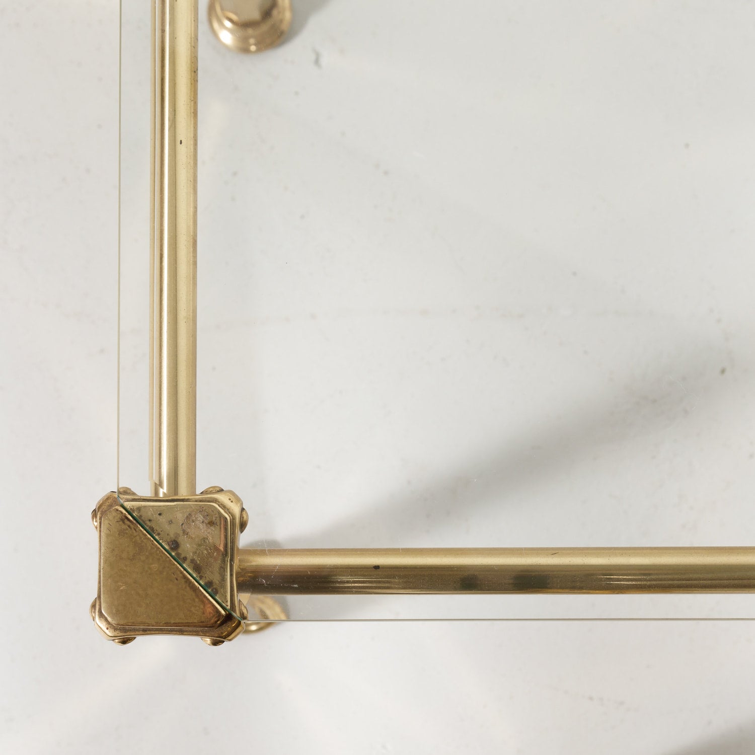 Set of Three French Mid-Century Modern Brass and Glass Nesting Tables by Maison Baguès