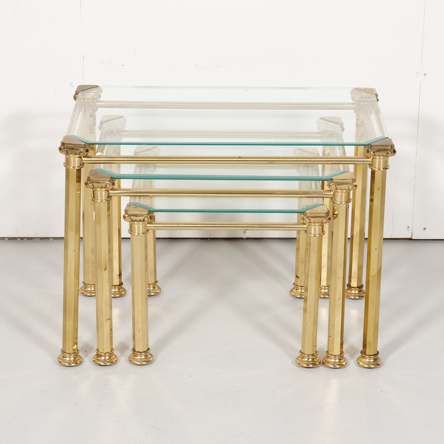 Set of Three French Mid-Century Modern Brass and Glass Nesting Tables by Maison Baguès