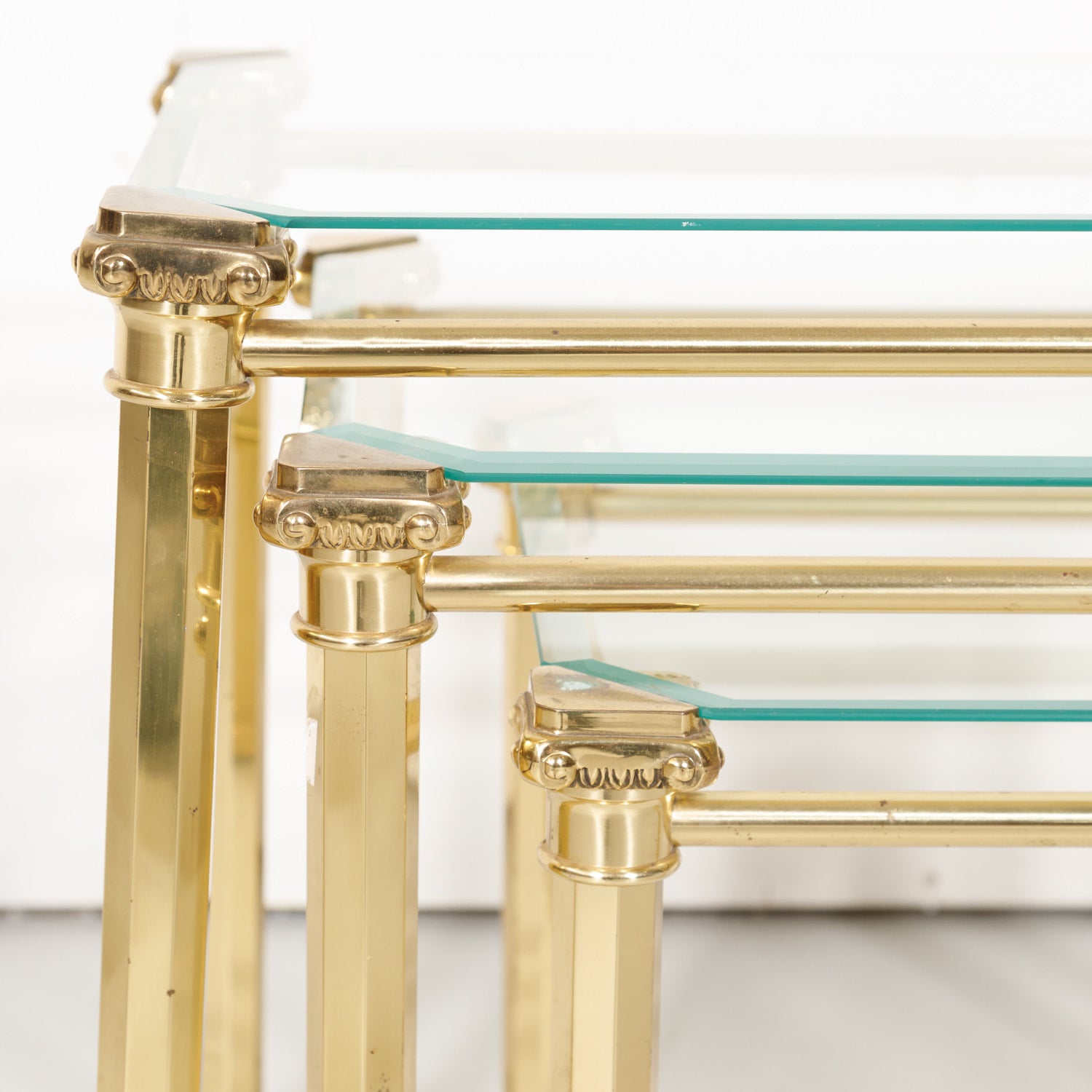 Set of Three French Mid-Century Modern Brass and Glass Nesting Tables by Maison Baguès