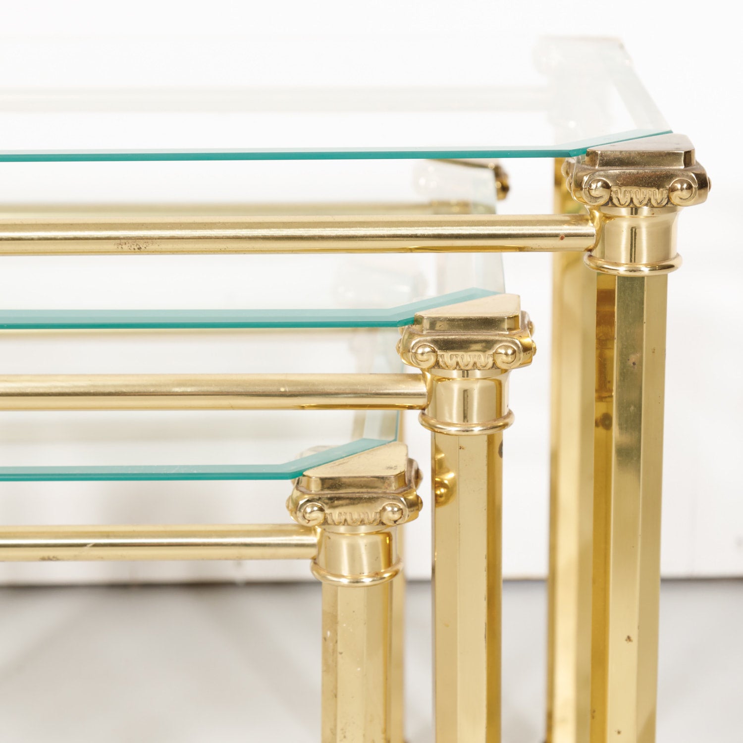 Set of Three French Mid-Century Modern Brass and Glass Nesting Tables by Maison Baguès