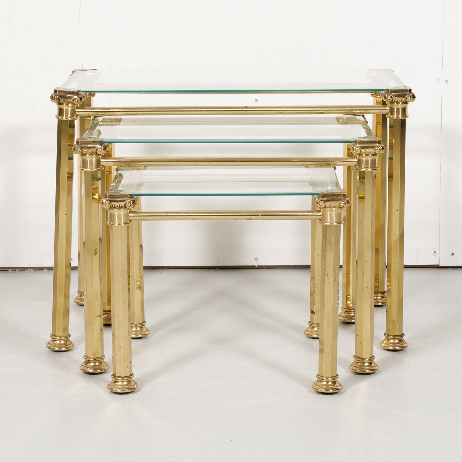 Set of Three French Mid-Century Modern Brass and Glass Nesting Tables by Maison Baguès