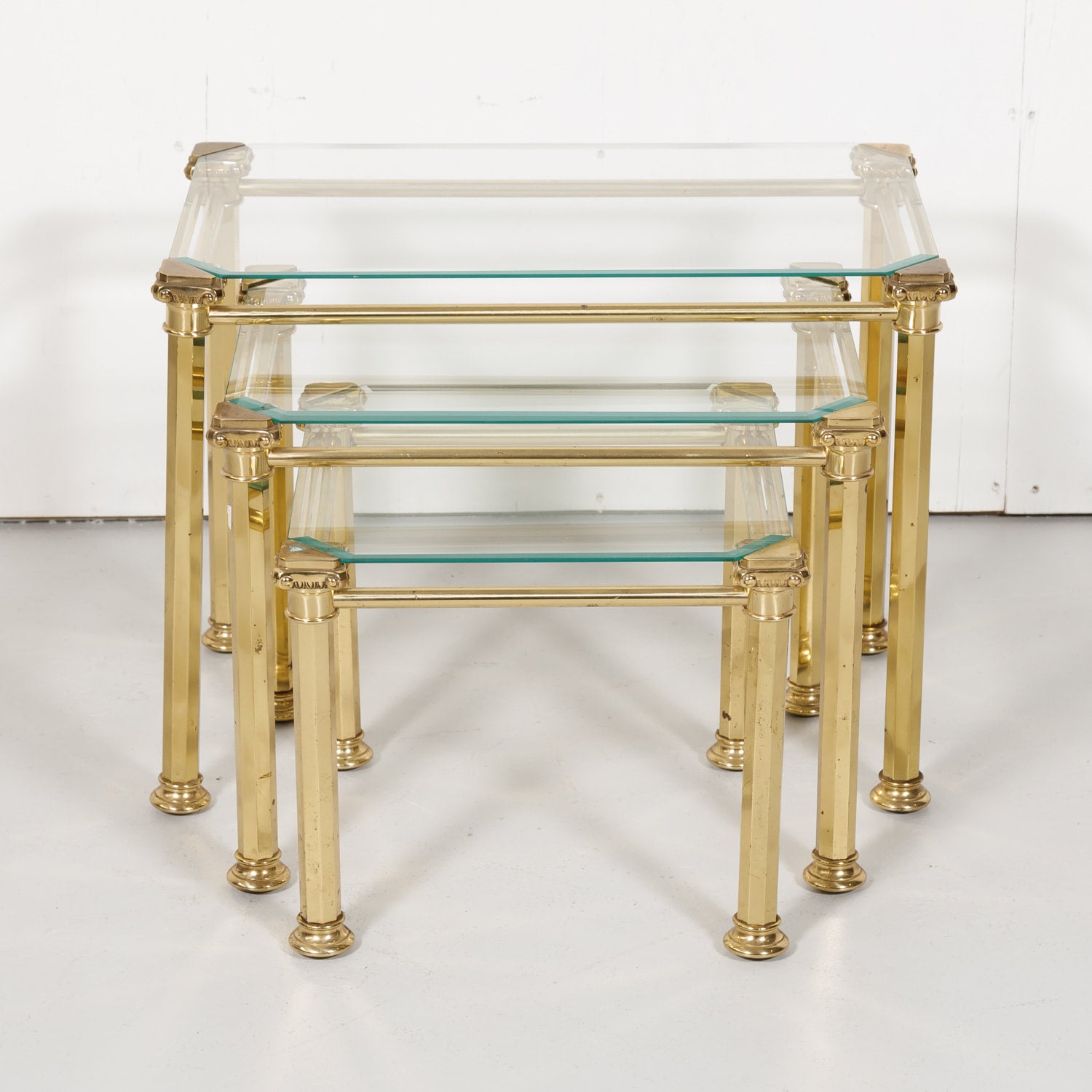 Set of Three French Mid-Century Modern Brass and Glass Nesting Tables by Maison Baguès