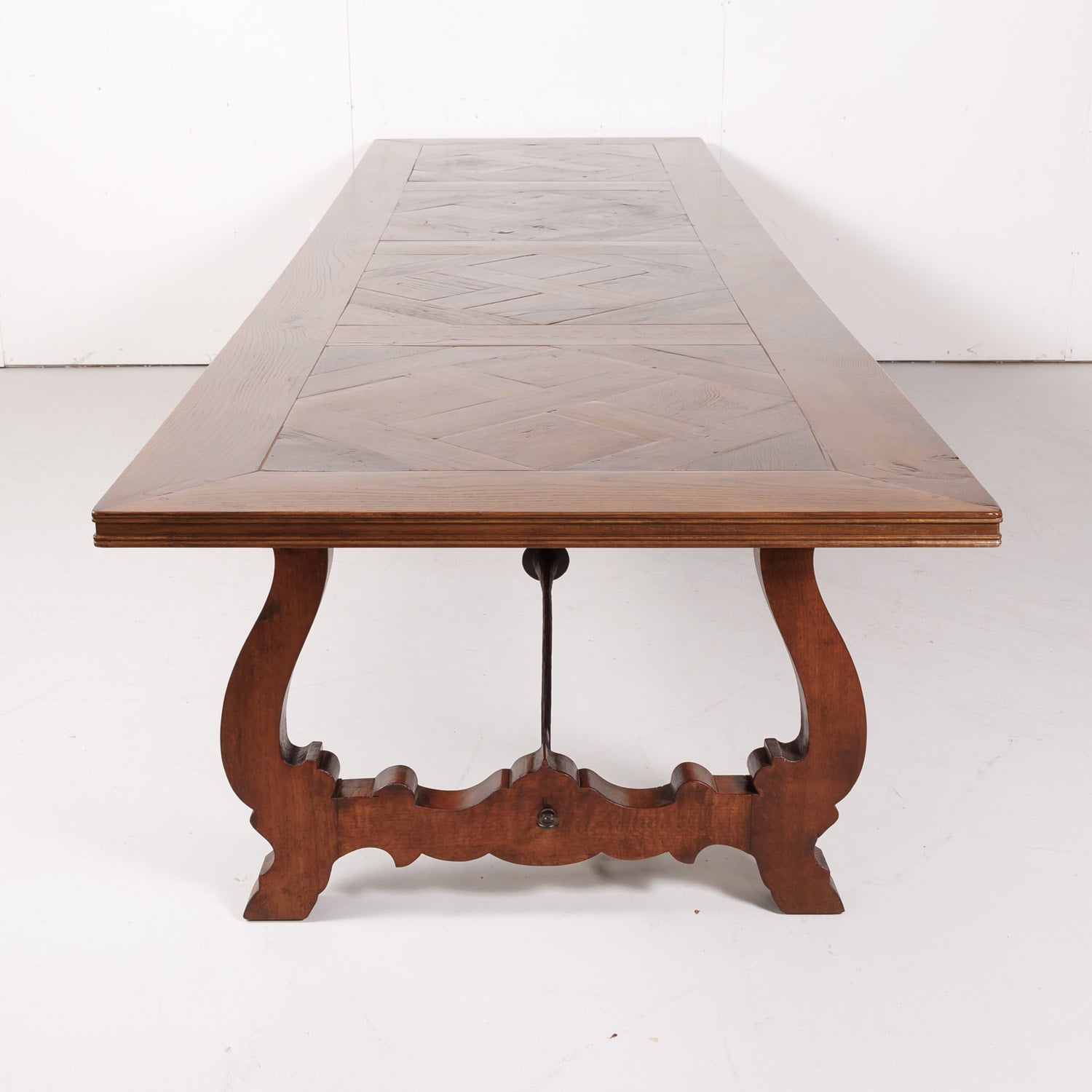 Impressive Antique French Walnut Trestle Table with Parquet de Versailles Top and Iron Stretcher