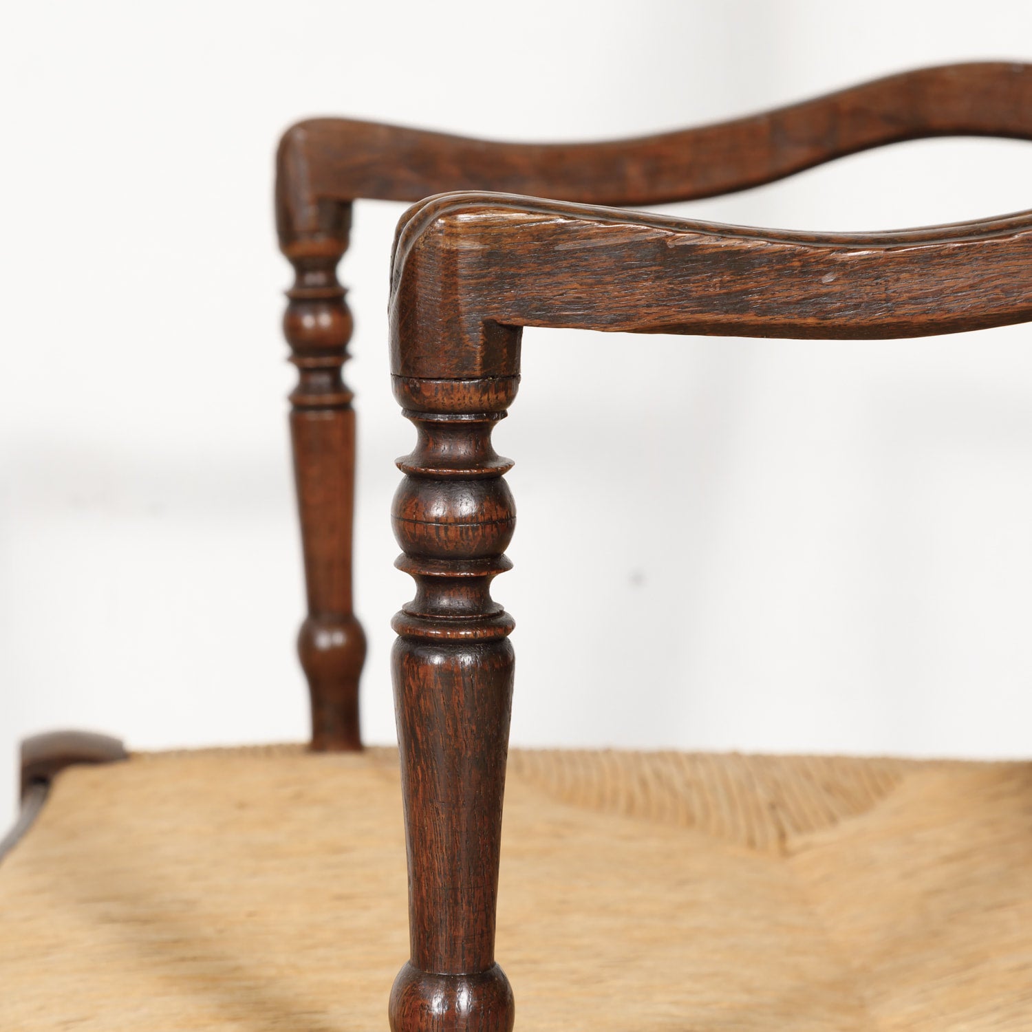 19th Century Country French Hand Carved Oak Rush Seat Armchair