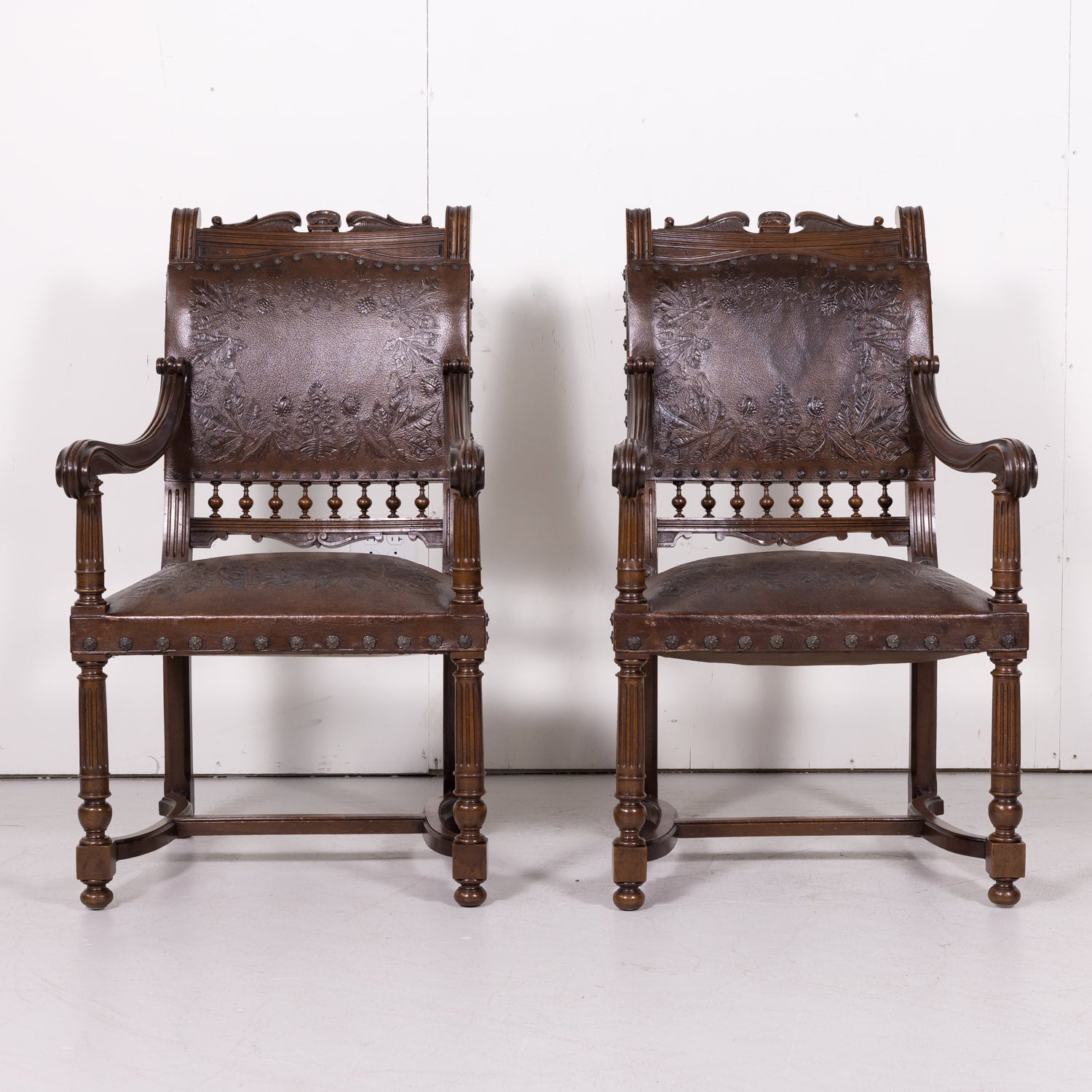 Pair of 19th Century French HenriI II Style Walnut and Tooled Leather Armchairs