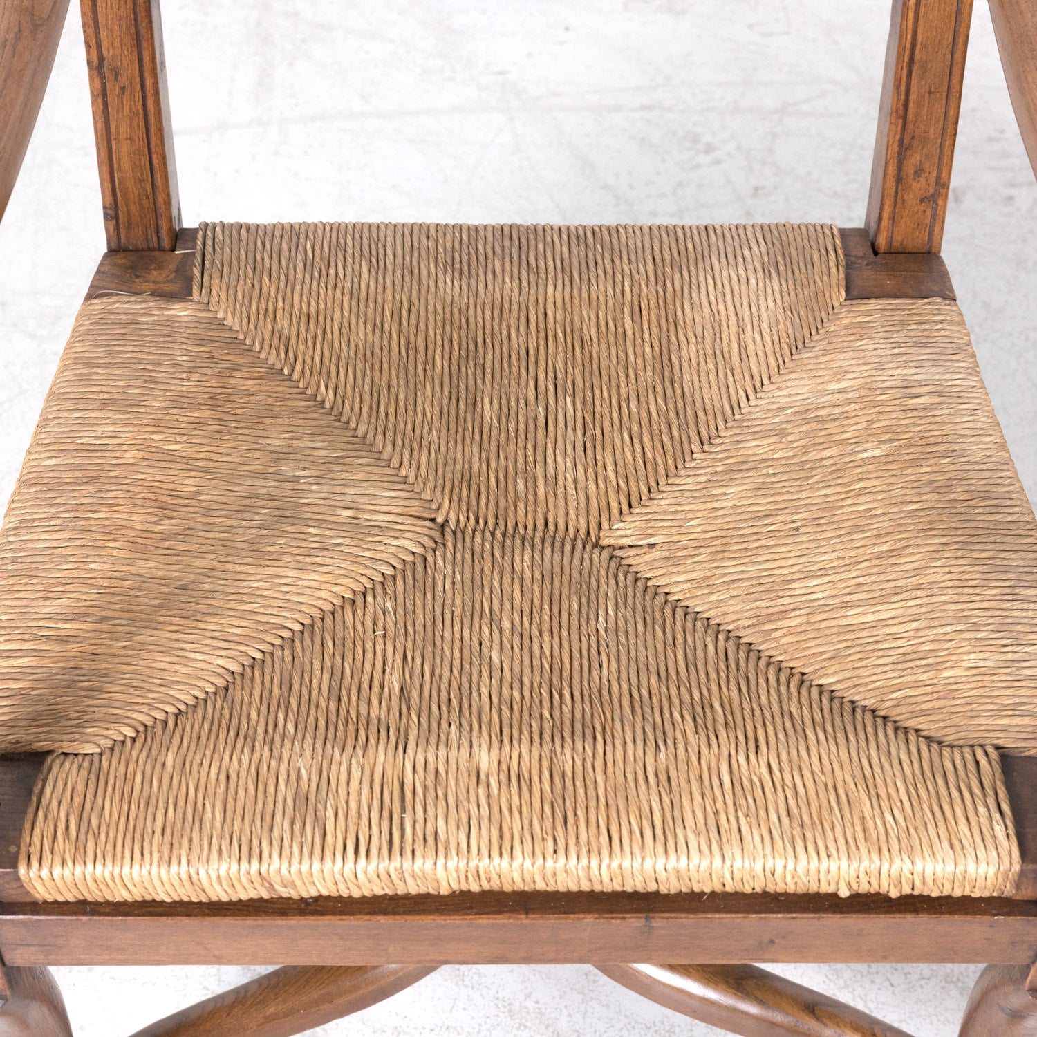 Pair of Antique Country French Louis XIV Style Oak Ladder Back Arm Chairs with Rush Seats