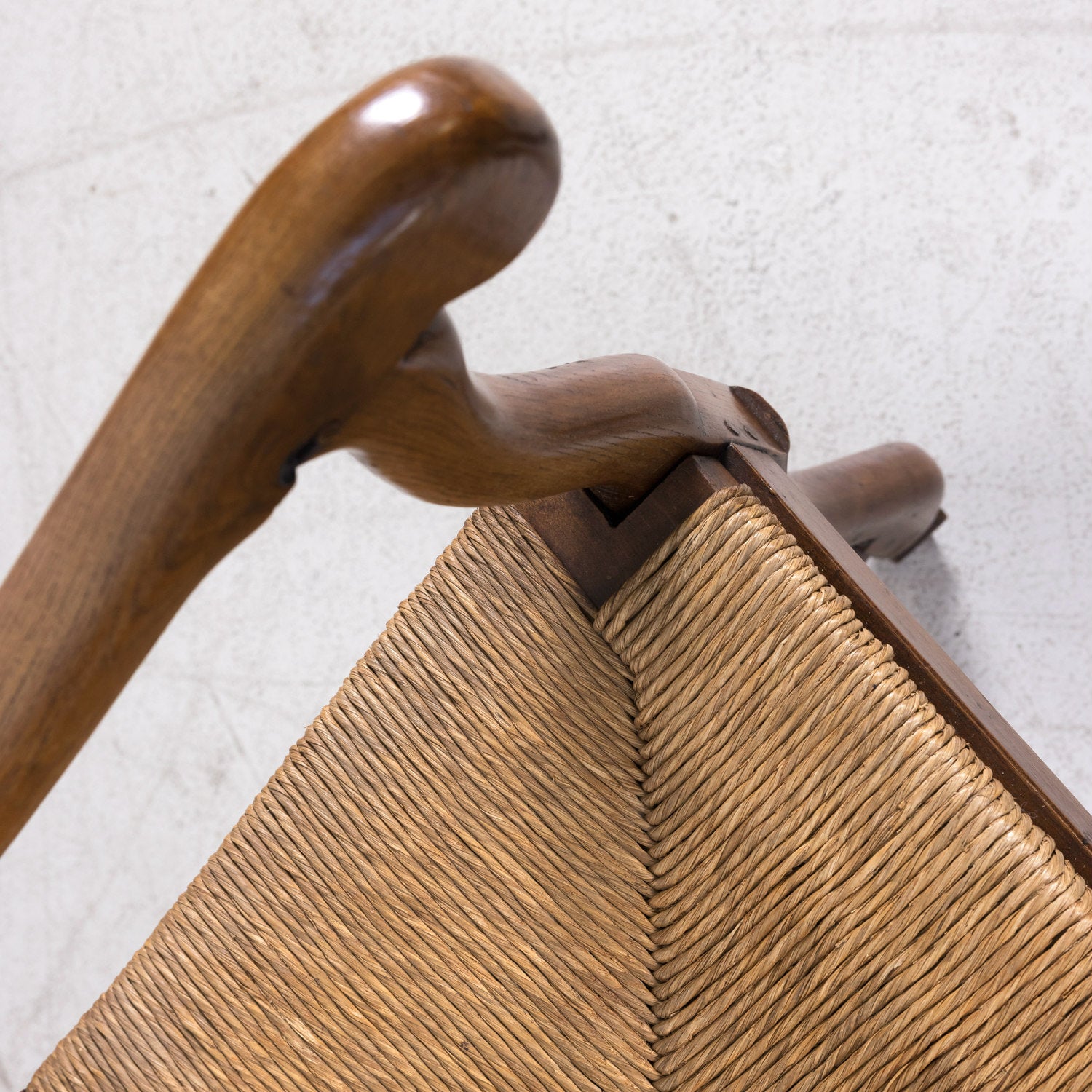 Pair of Antique Country French Louis XIV Style Oak Ladder Back Arm Chairs with Rush Seats